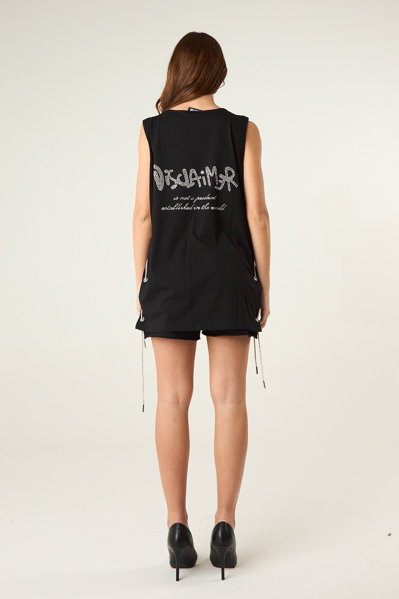 Canotta over con dettagli preziosi