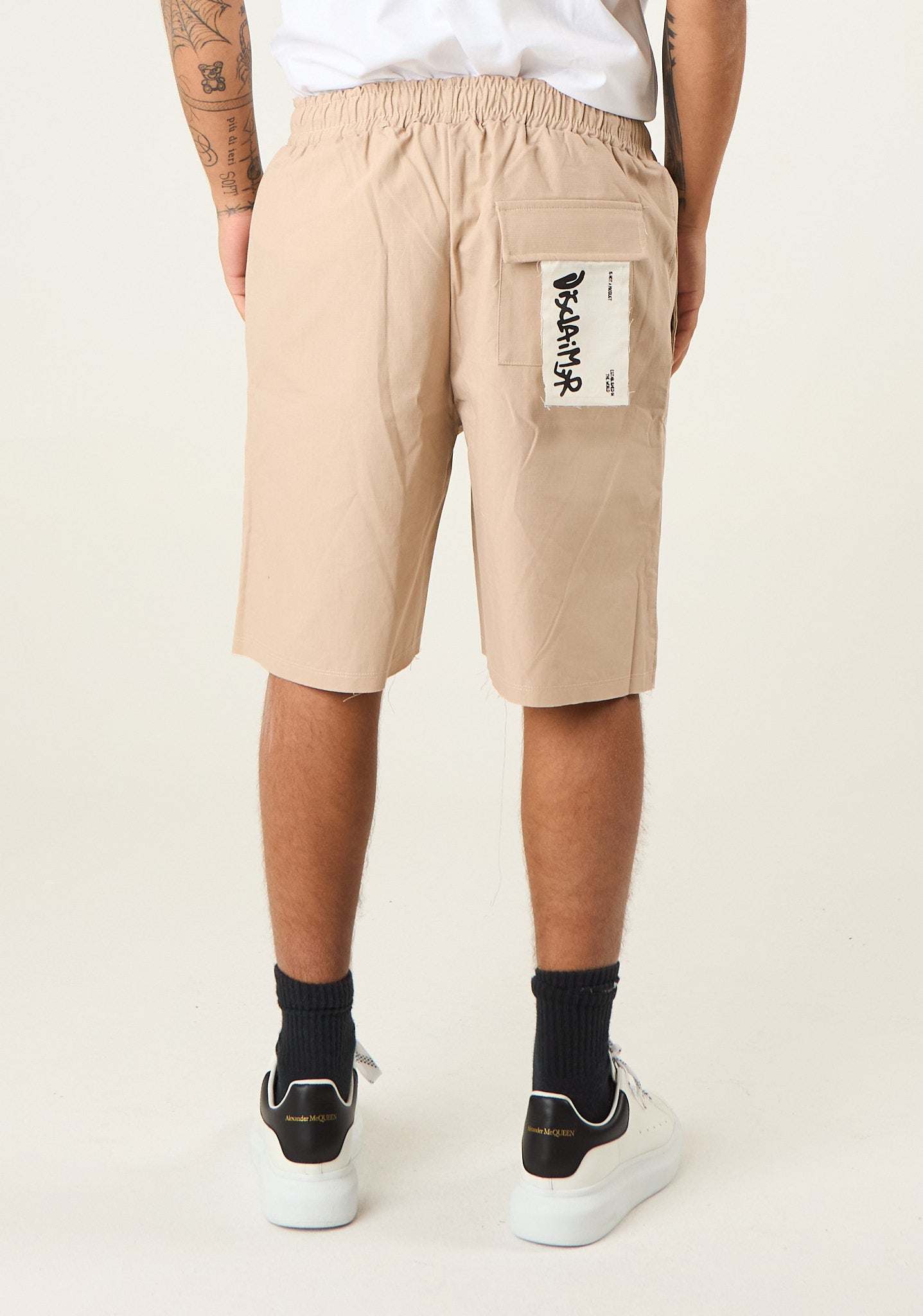 Bermuda in gabardina con patch posteriore