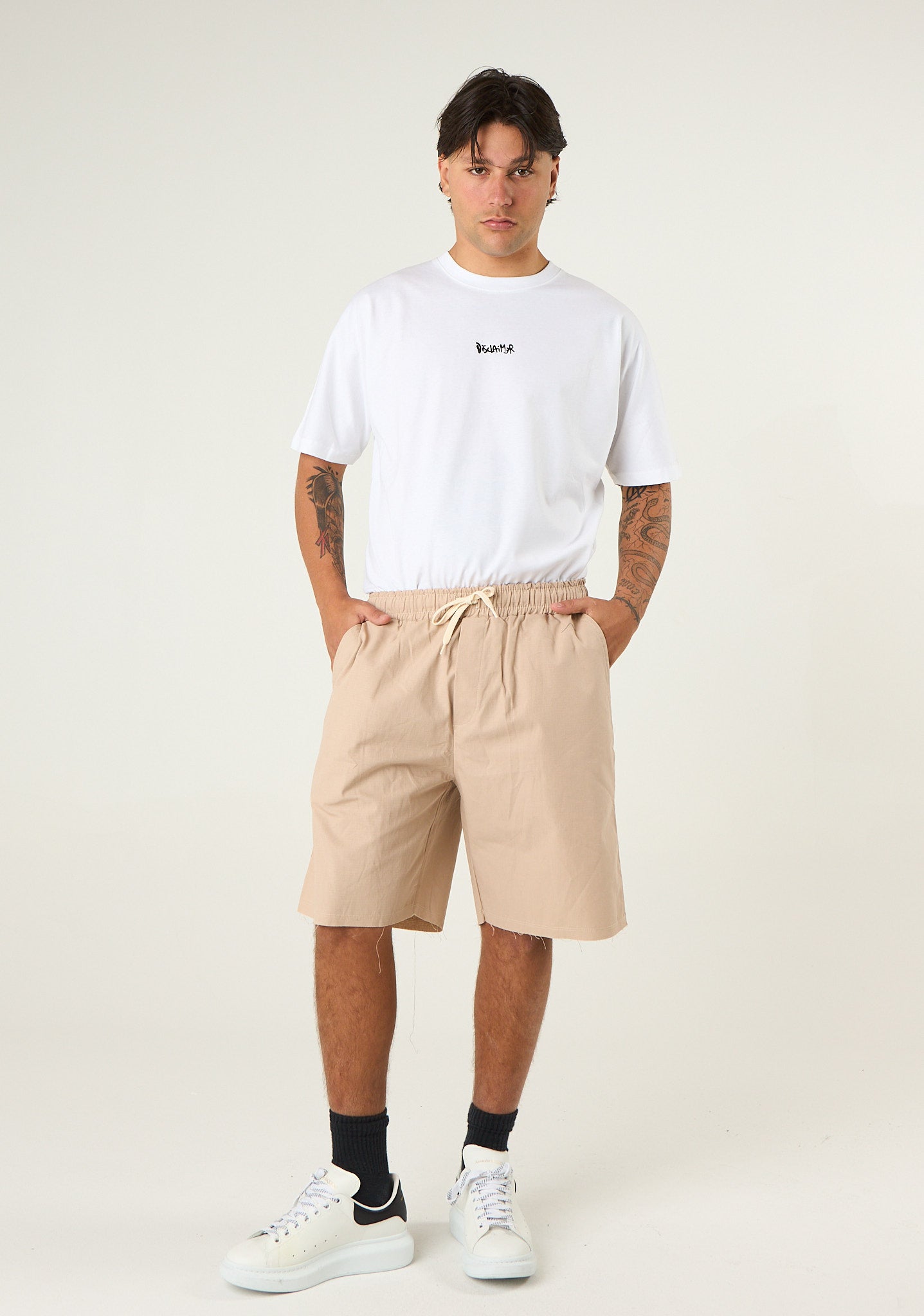 Bermuda in gabardina con patch posteriore