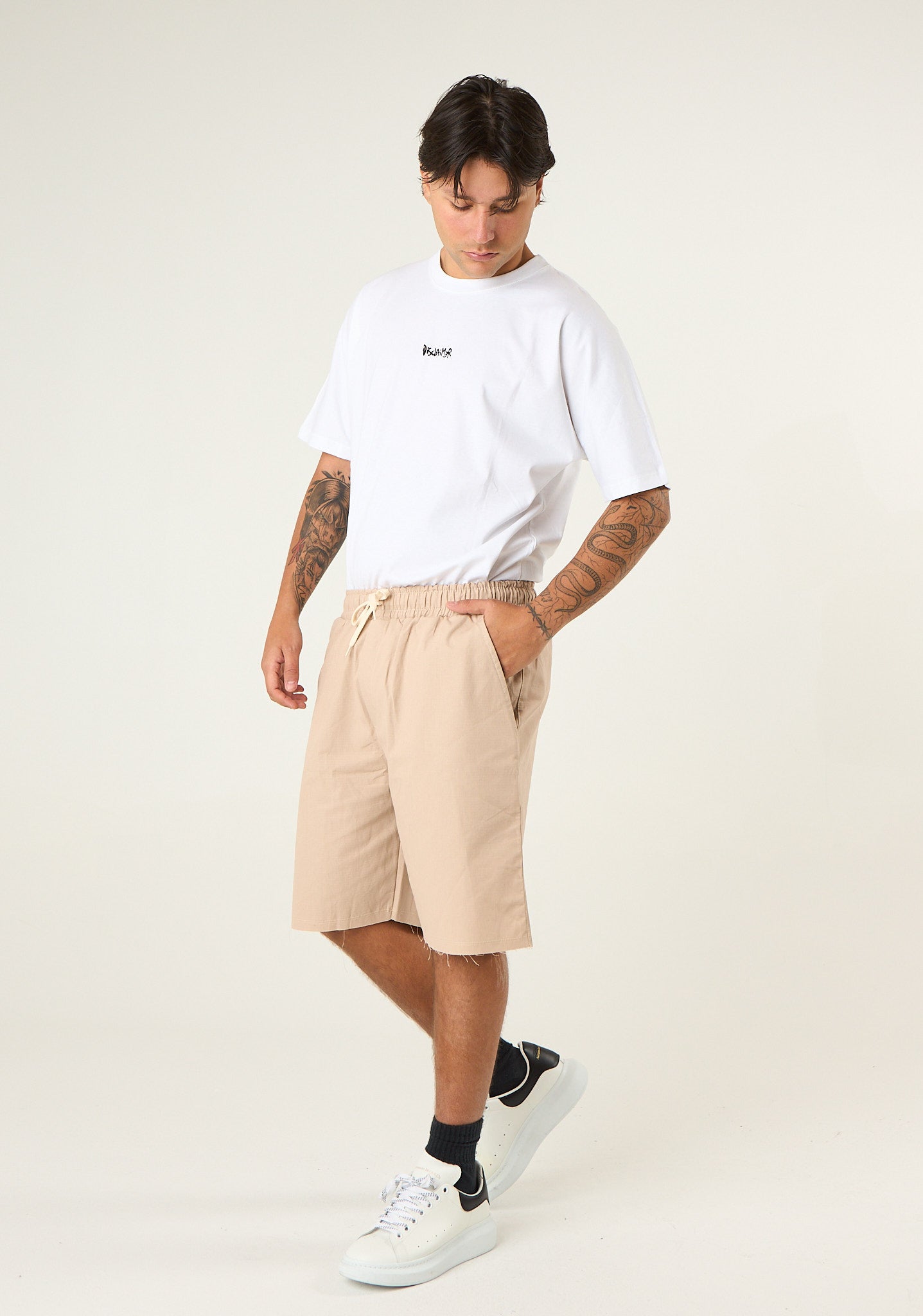 Bermuda in gabardina con patch posteriore