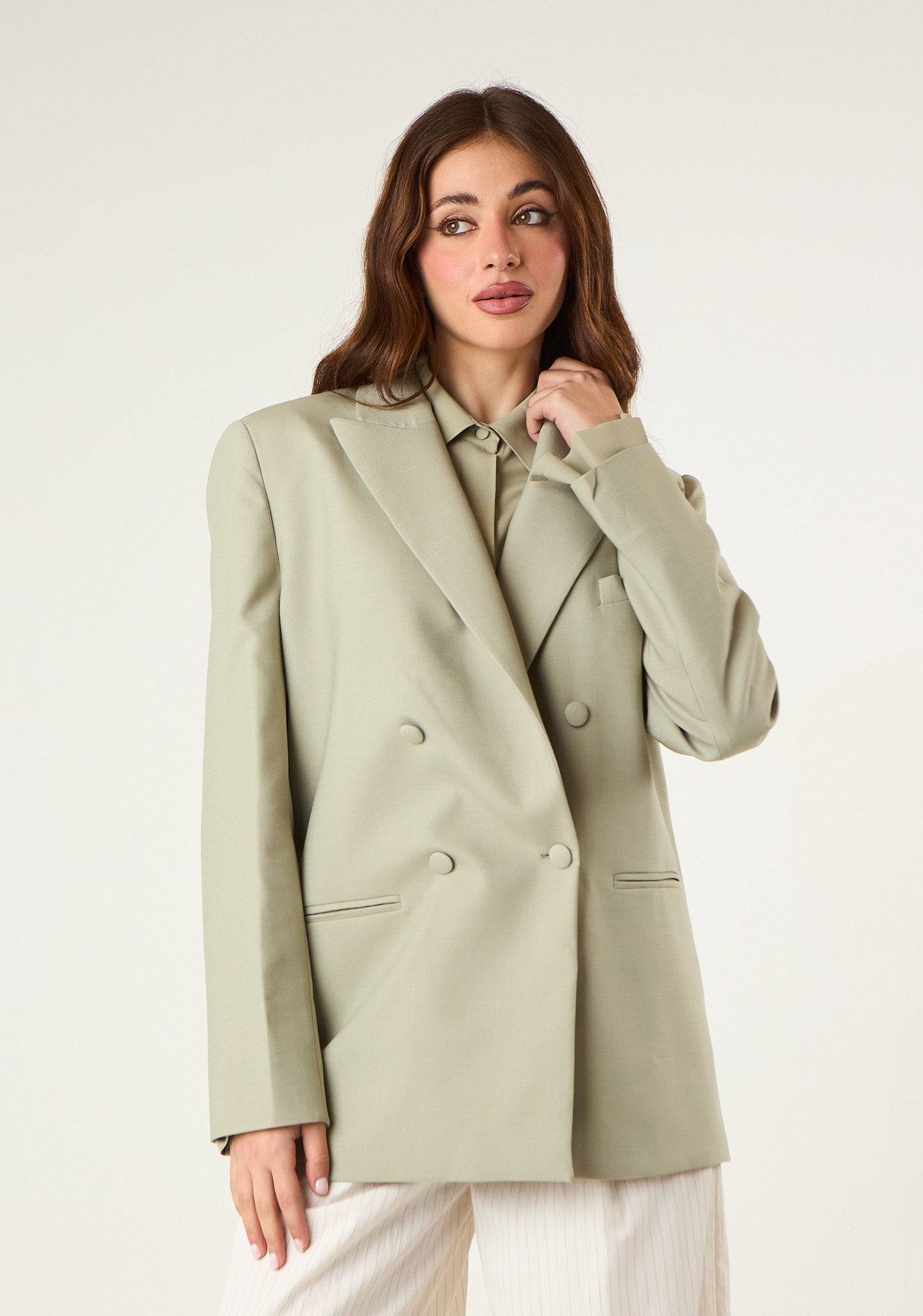 Giacca doppiopetto con bottoni in tono