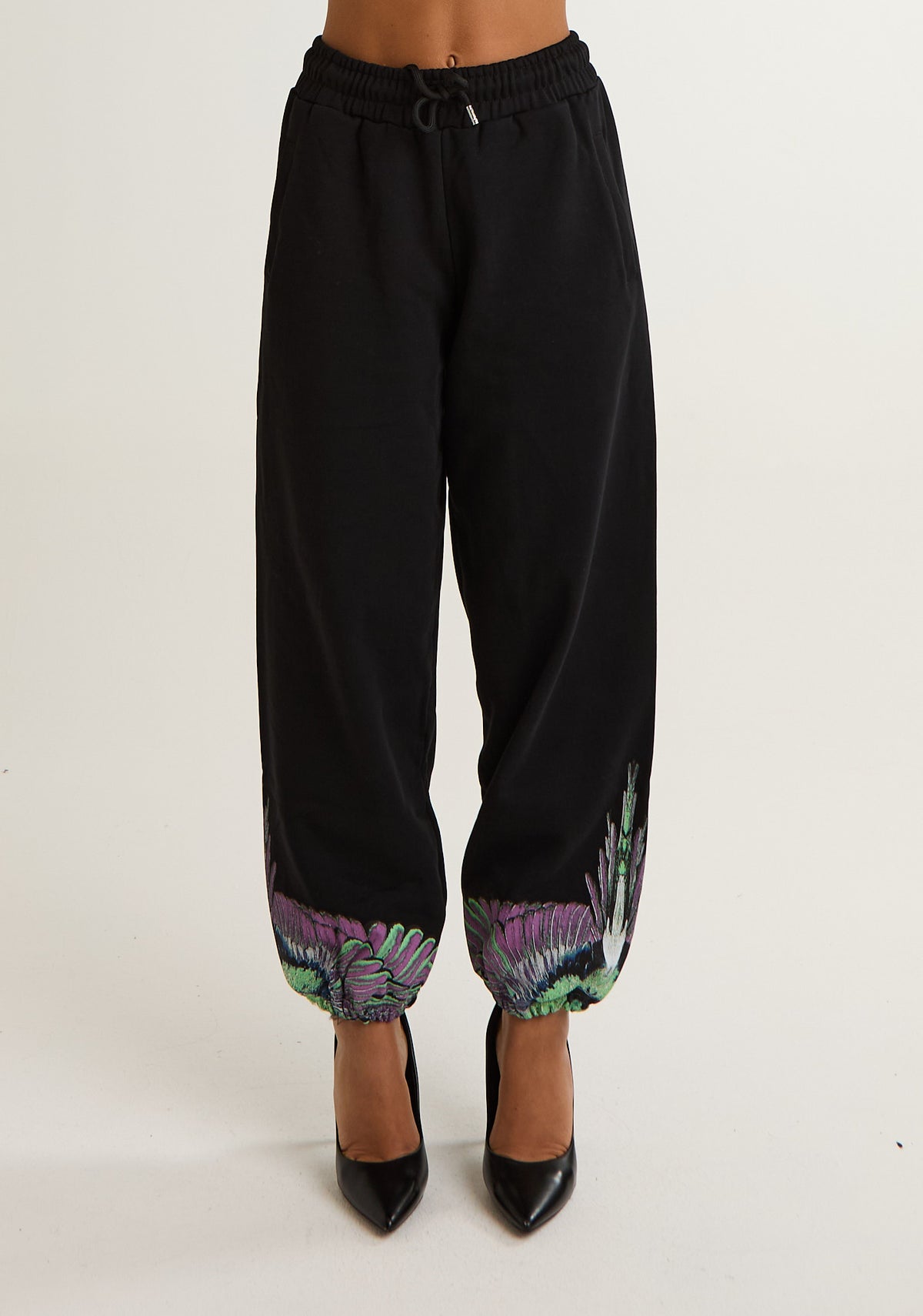 Pantalone tuta con ali colorate