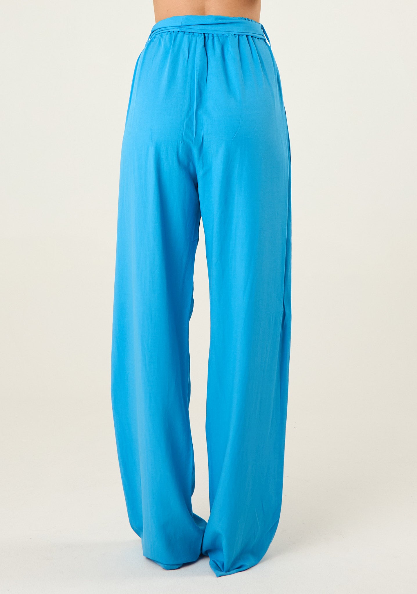 Pantalone palazzo con fusciacca in vita