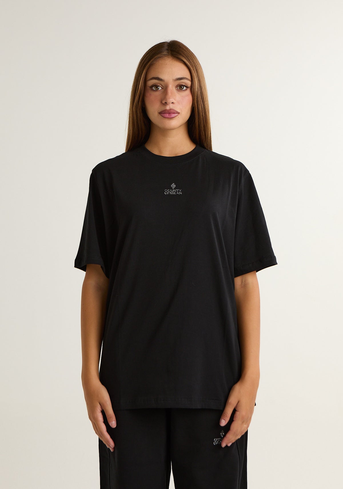 T-shirt con applicazioni posteriori