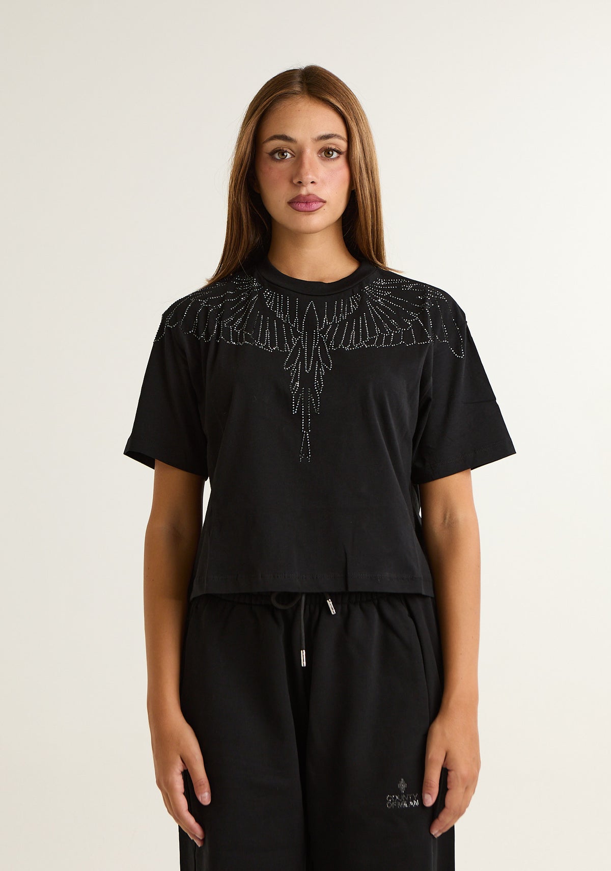 T-shirt con ali preziose