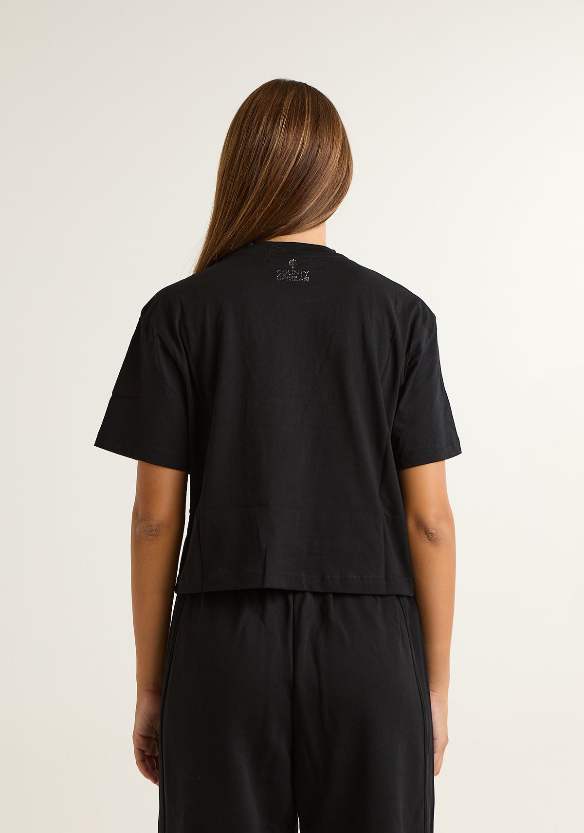 T-shirt con ali preziose