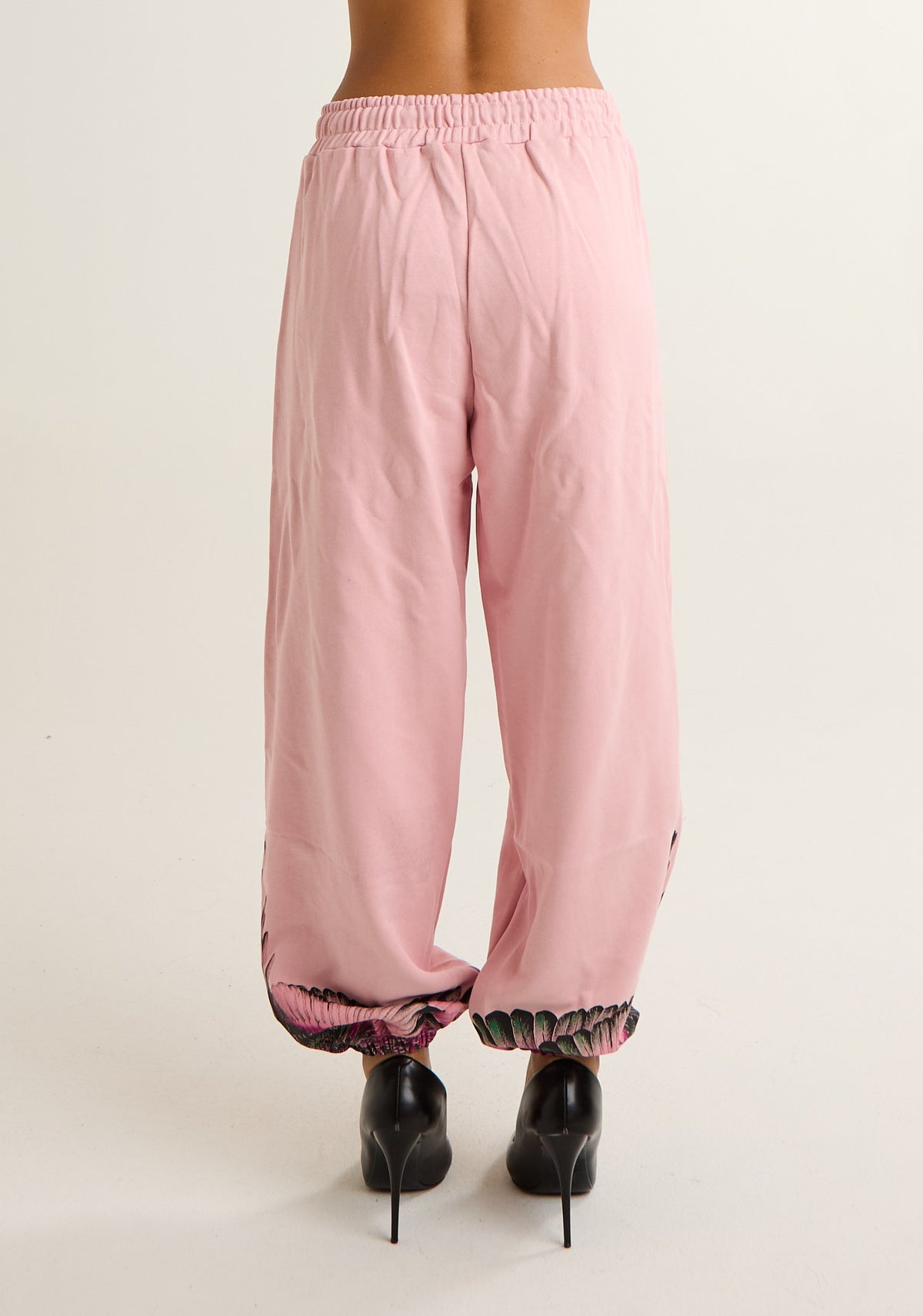 Pantalone tuta con ali colorate