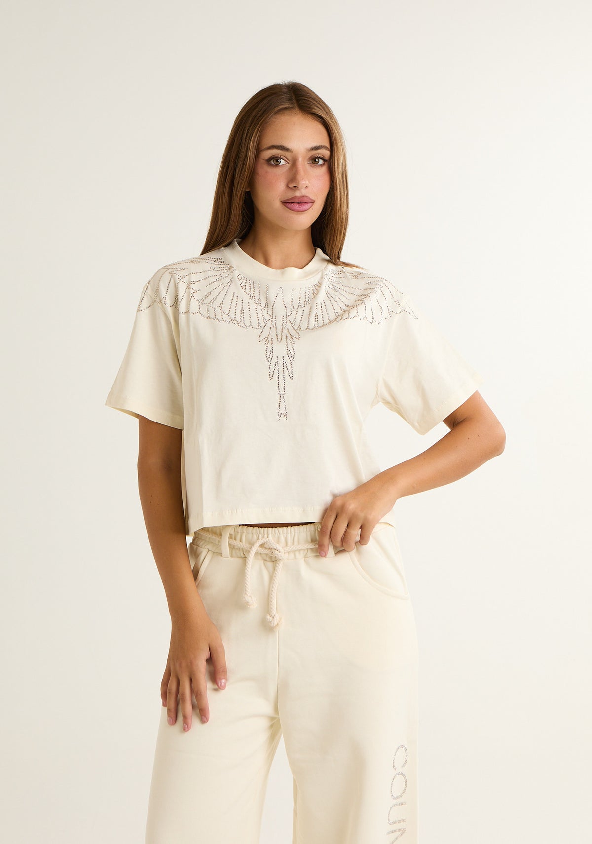 T-shirt con ali preziose