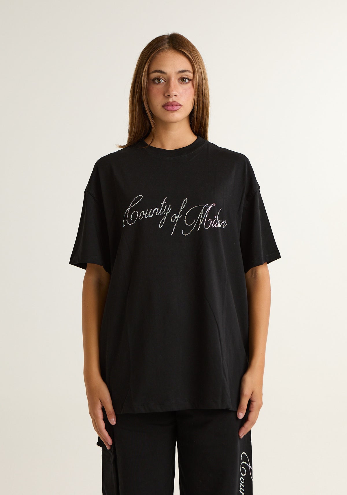T-shirt con logo prezioso applicato