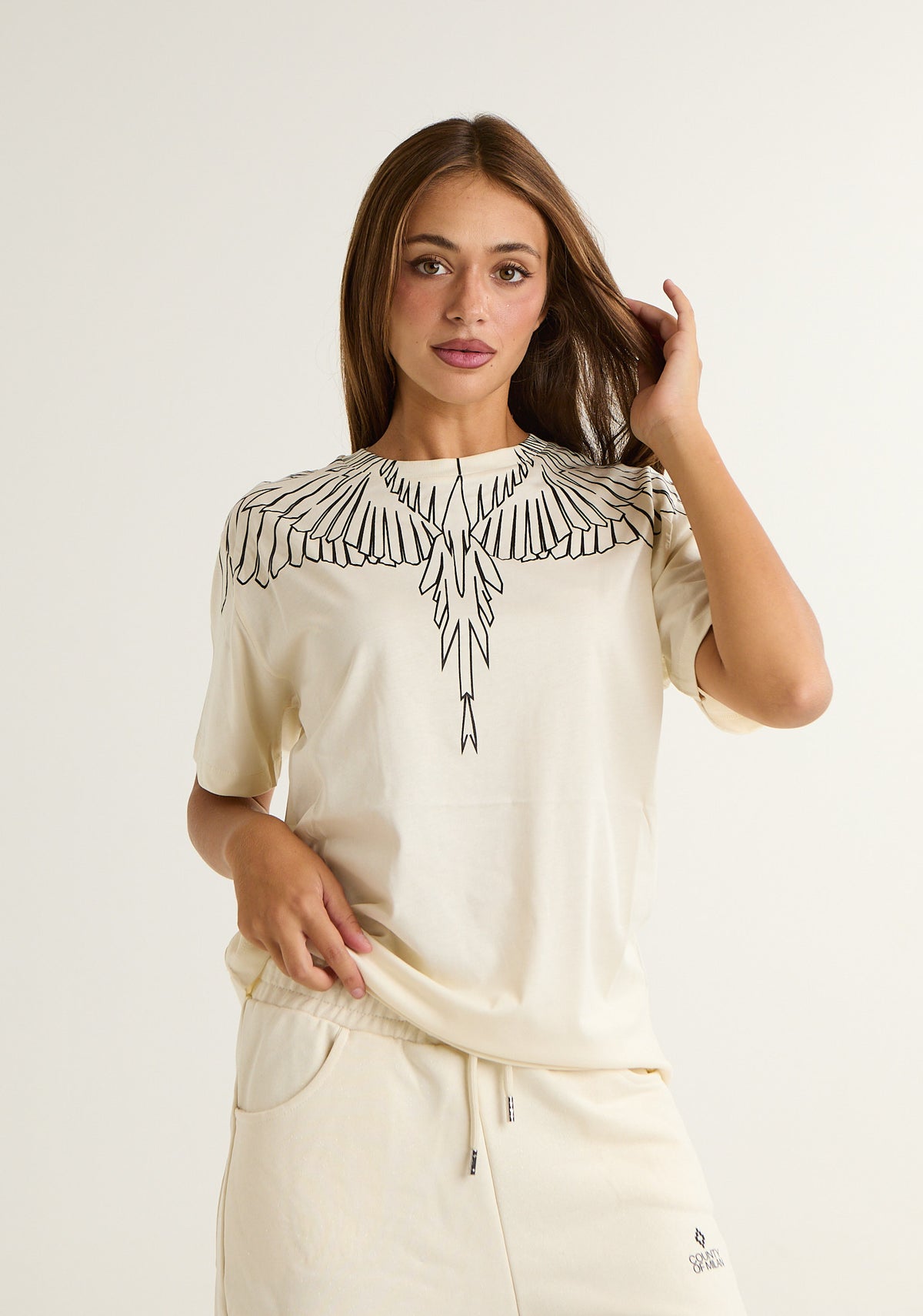 T-shirt con ali a contrasto