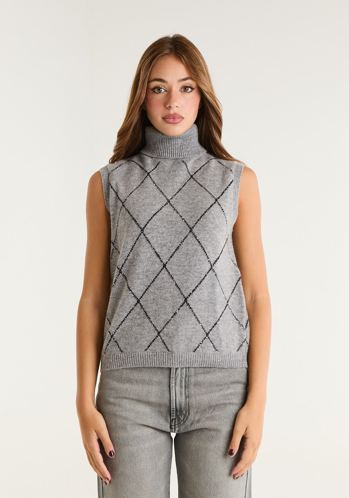 Maglia smanicata collo alto