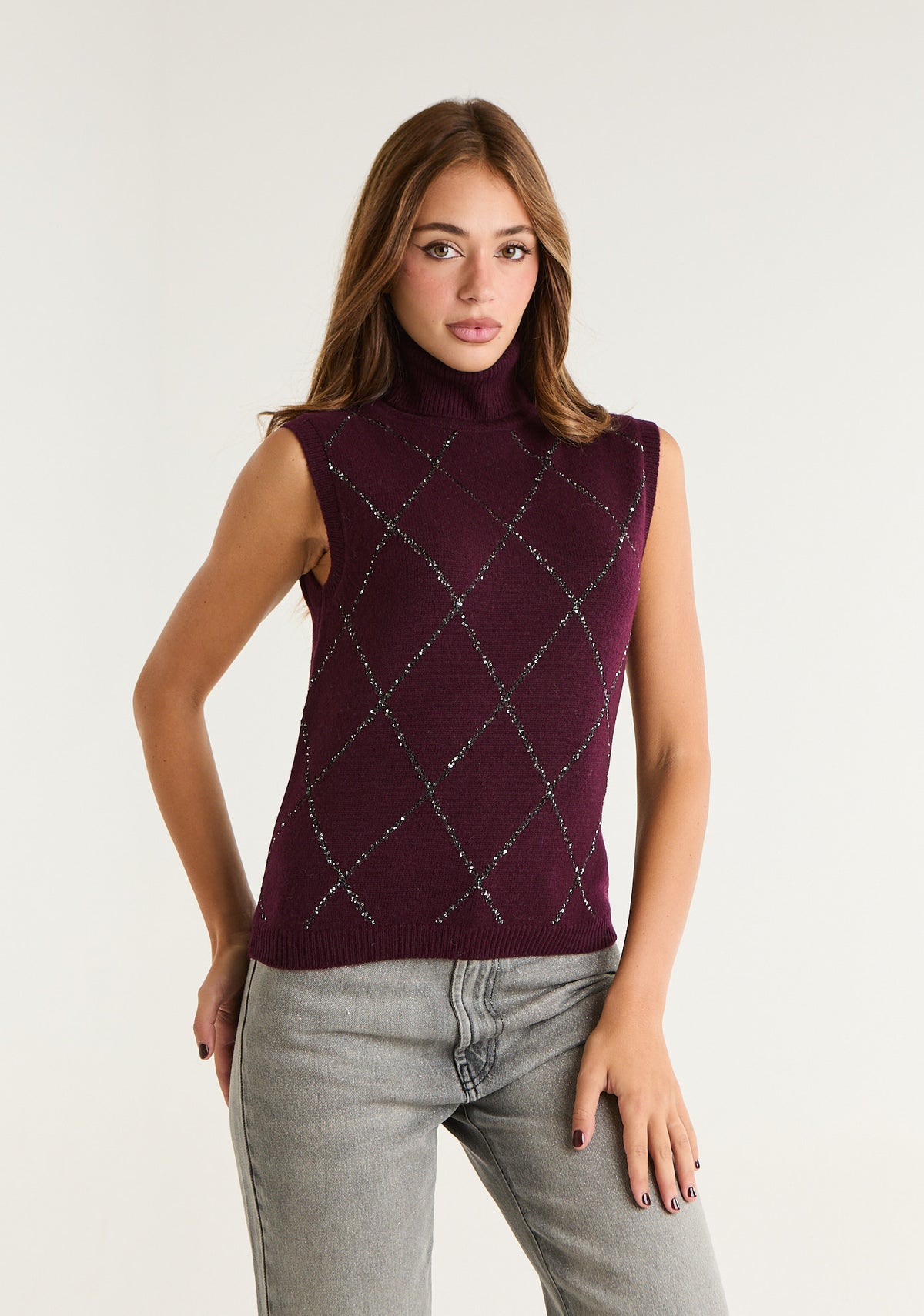 Maglia smanicata collo alto