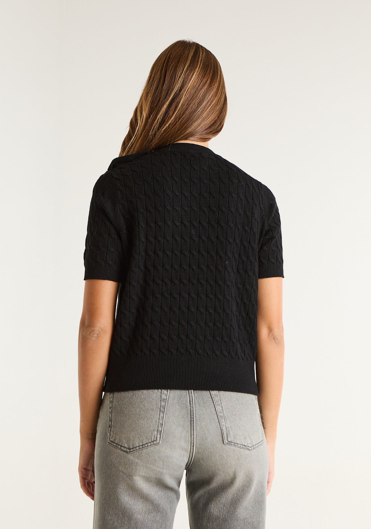 Maglia con lavorazione a trecce