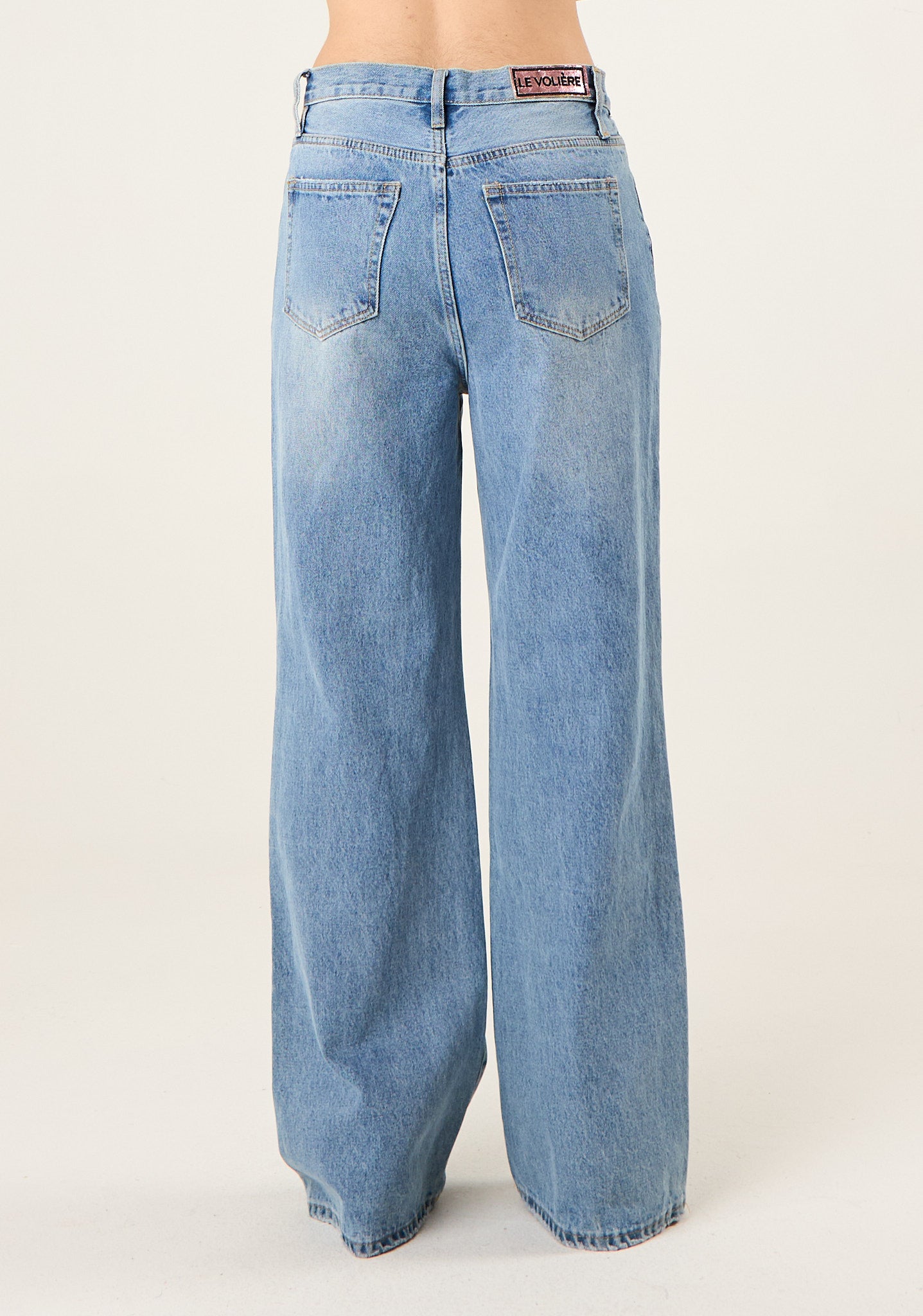 Jeans con dettagli in catena