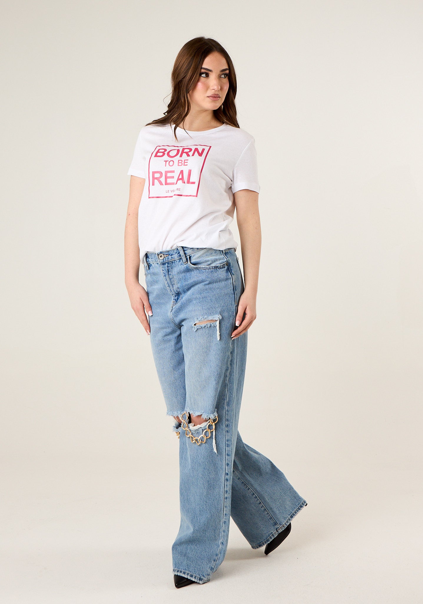 Jeans con dettagli in catena