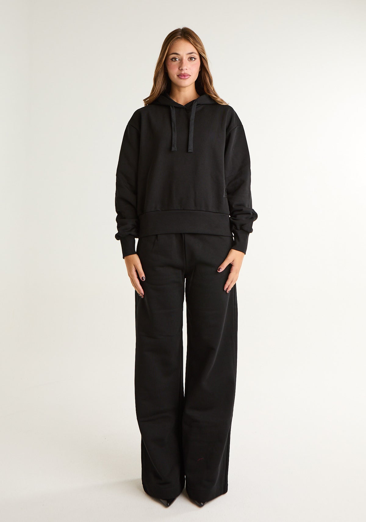 Pantalone palazzo in felpa con patch logato