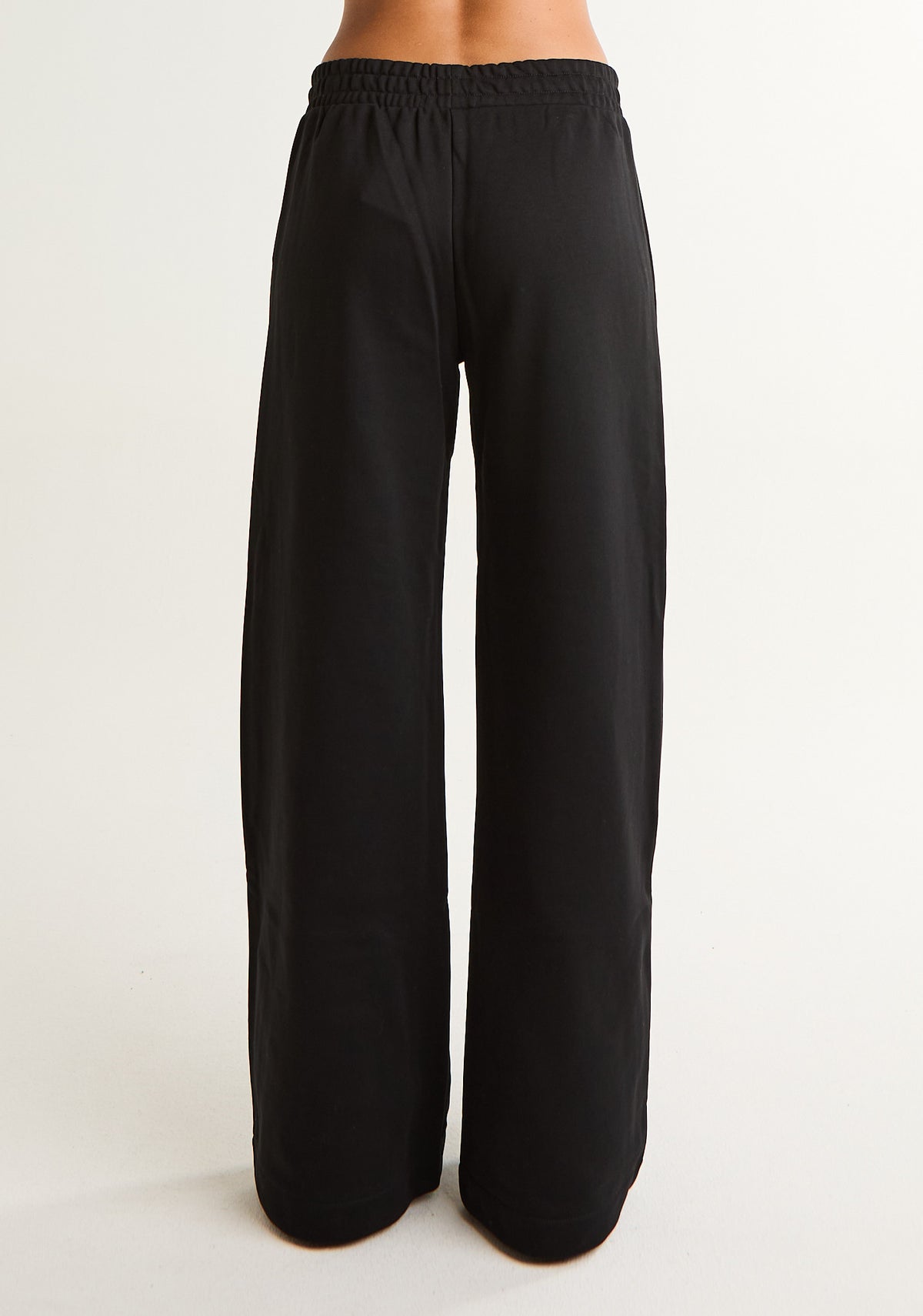 Pantalone palazzo in felpa con patch logato
