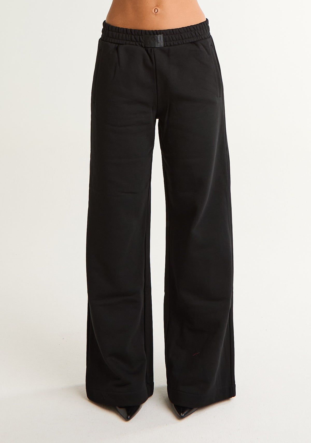 Pantalone palazzo in felpa con patch logato
