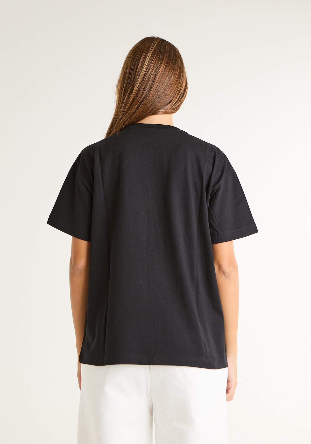 T-shirt con stampa e applicazioni