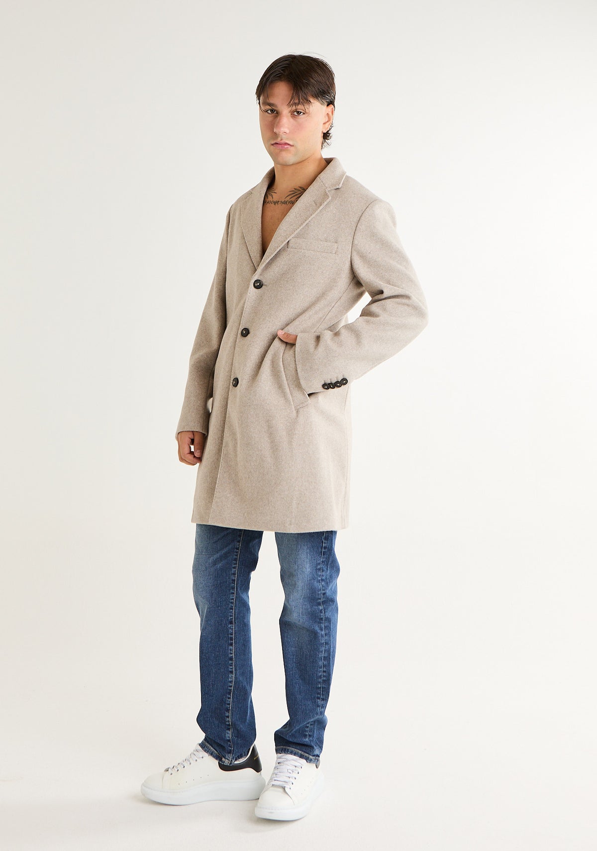 Cappotto con dettaglio removibile