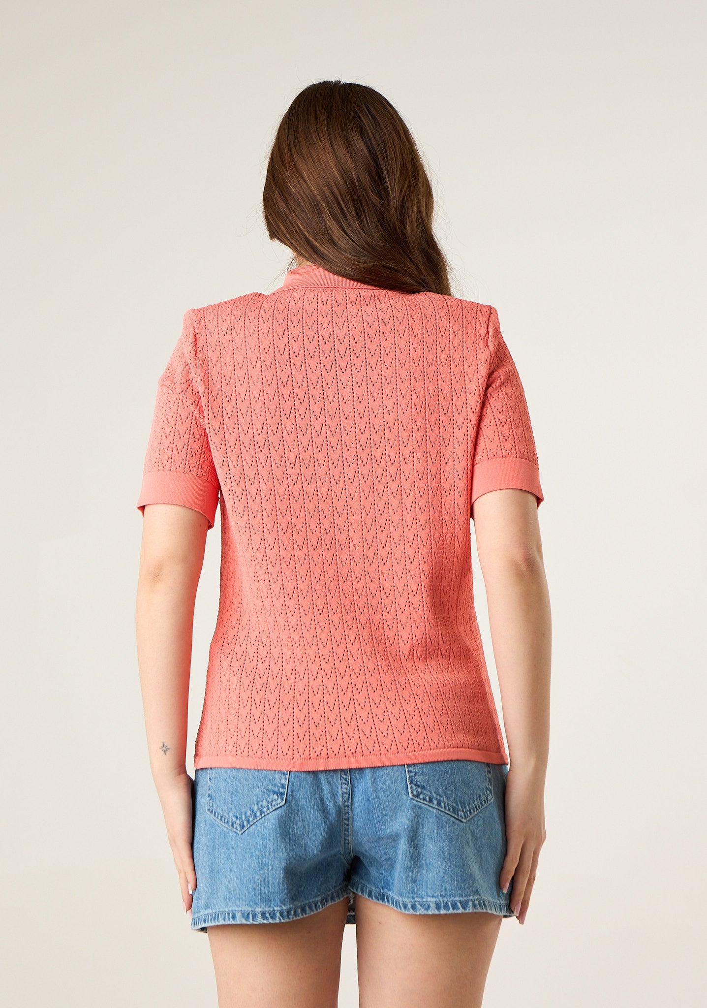 Polo in maglia traforata