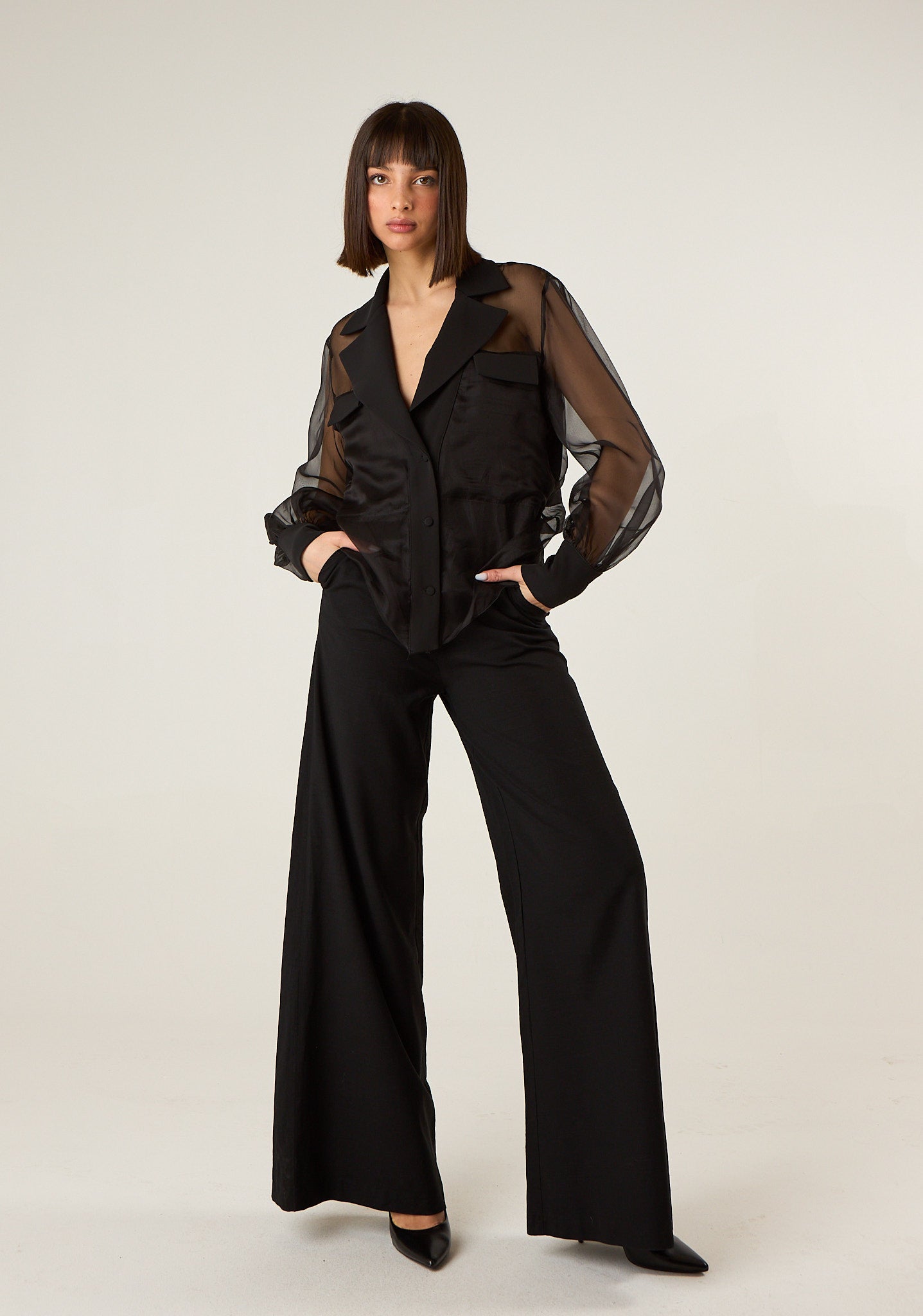 Pantalone con corpetto alto