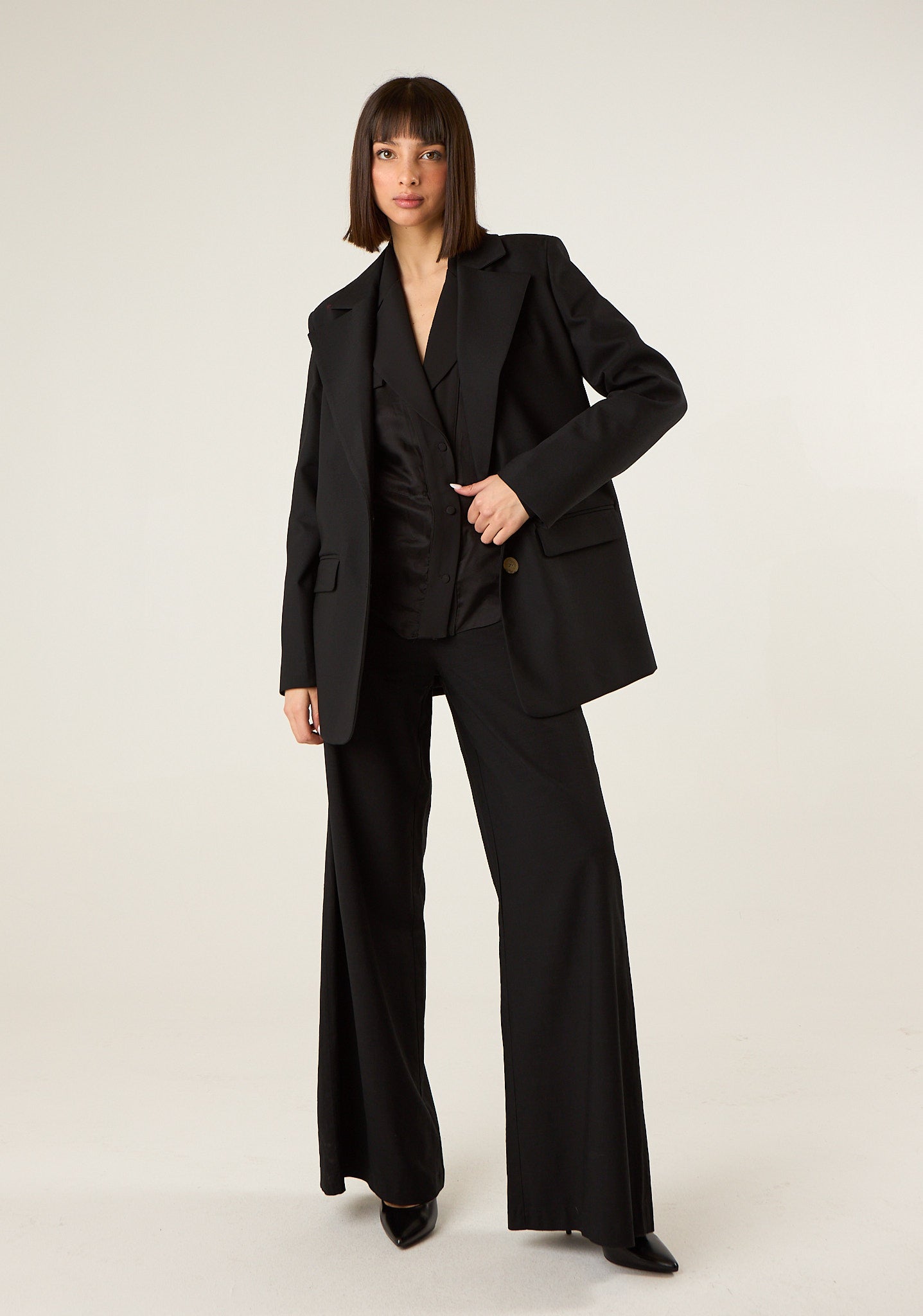 Pantalone con corpetto alto