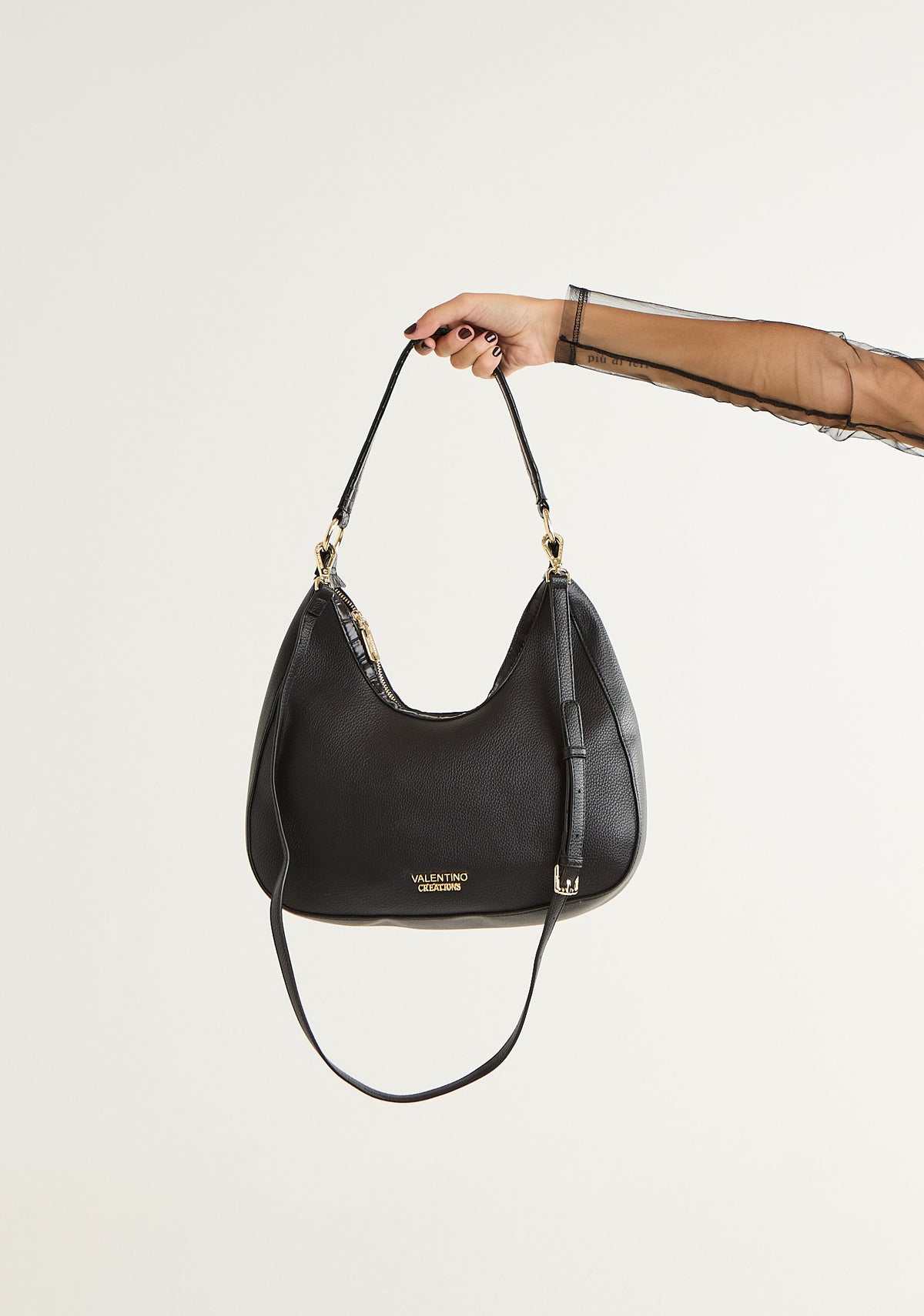 Borsa mezzalunga con tracolla removibile