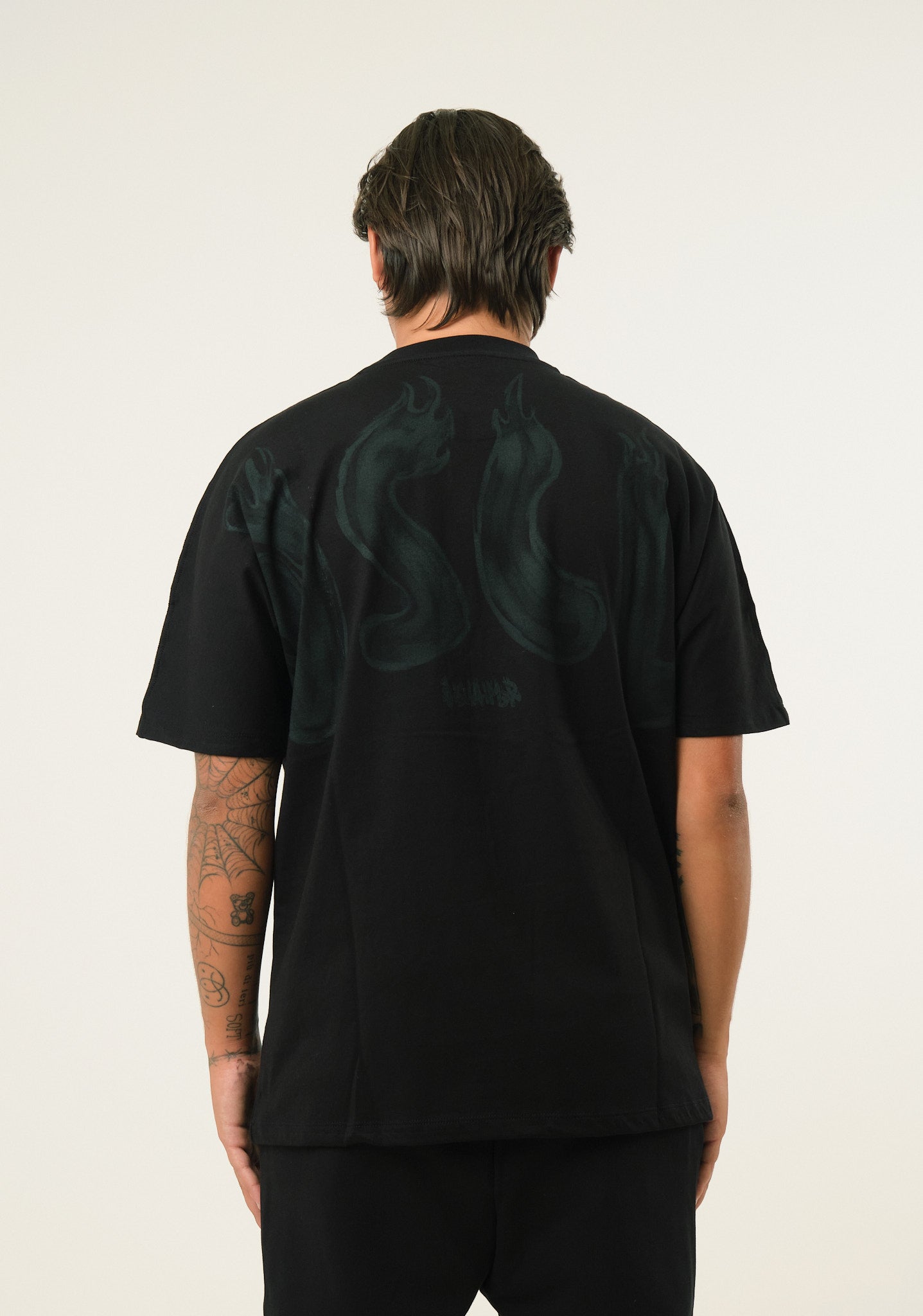 T-shirt con stampa posteriore