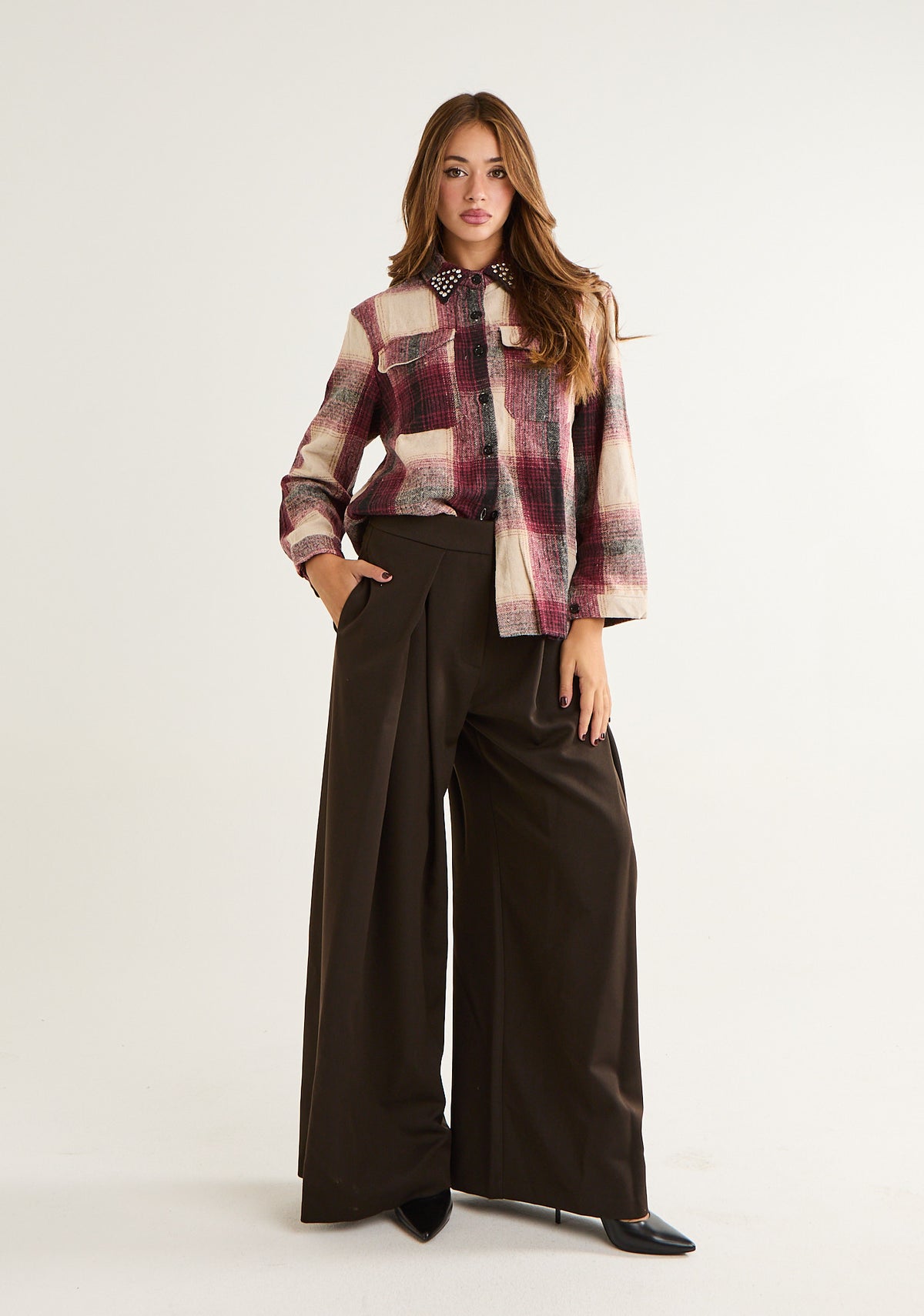 Pantalone con piega