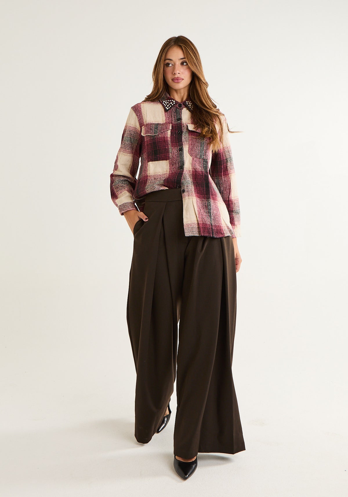 Pantalone con piega