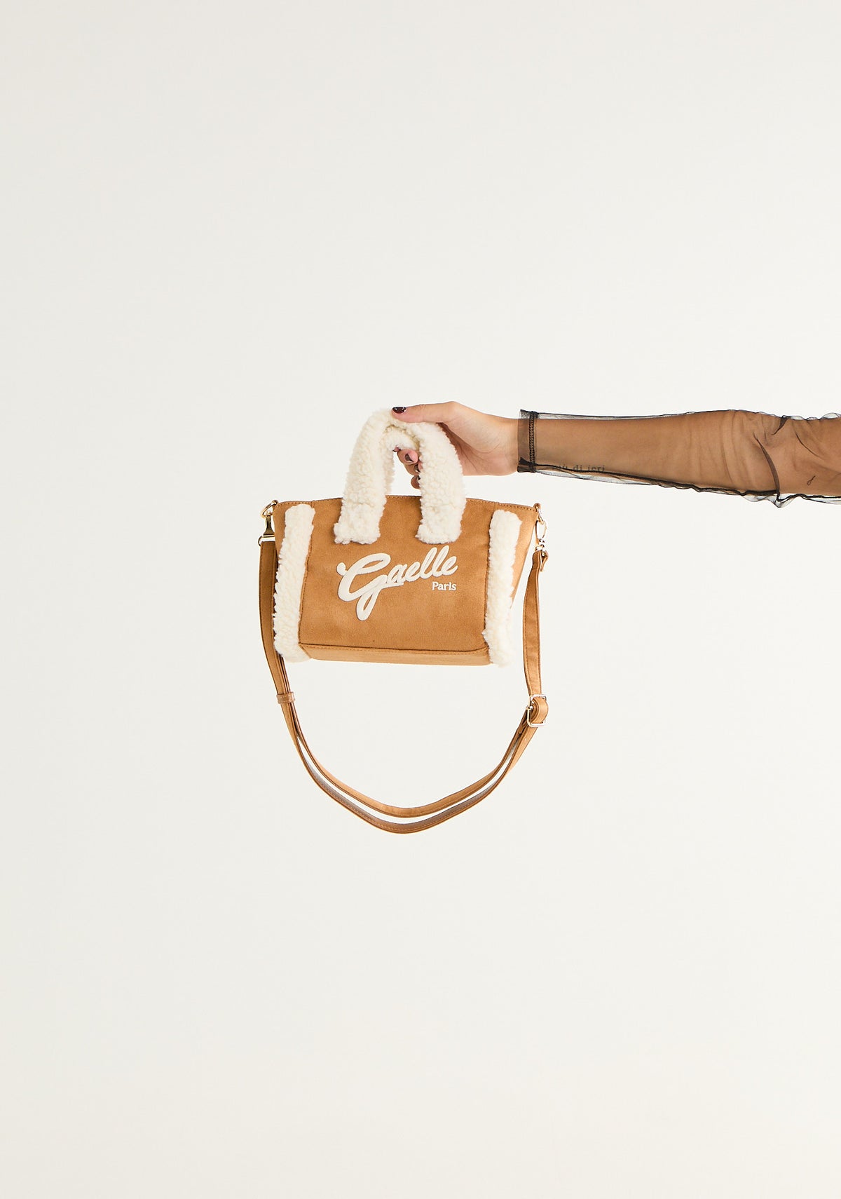 Borsa mini con inserti in montone