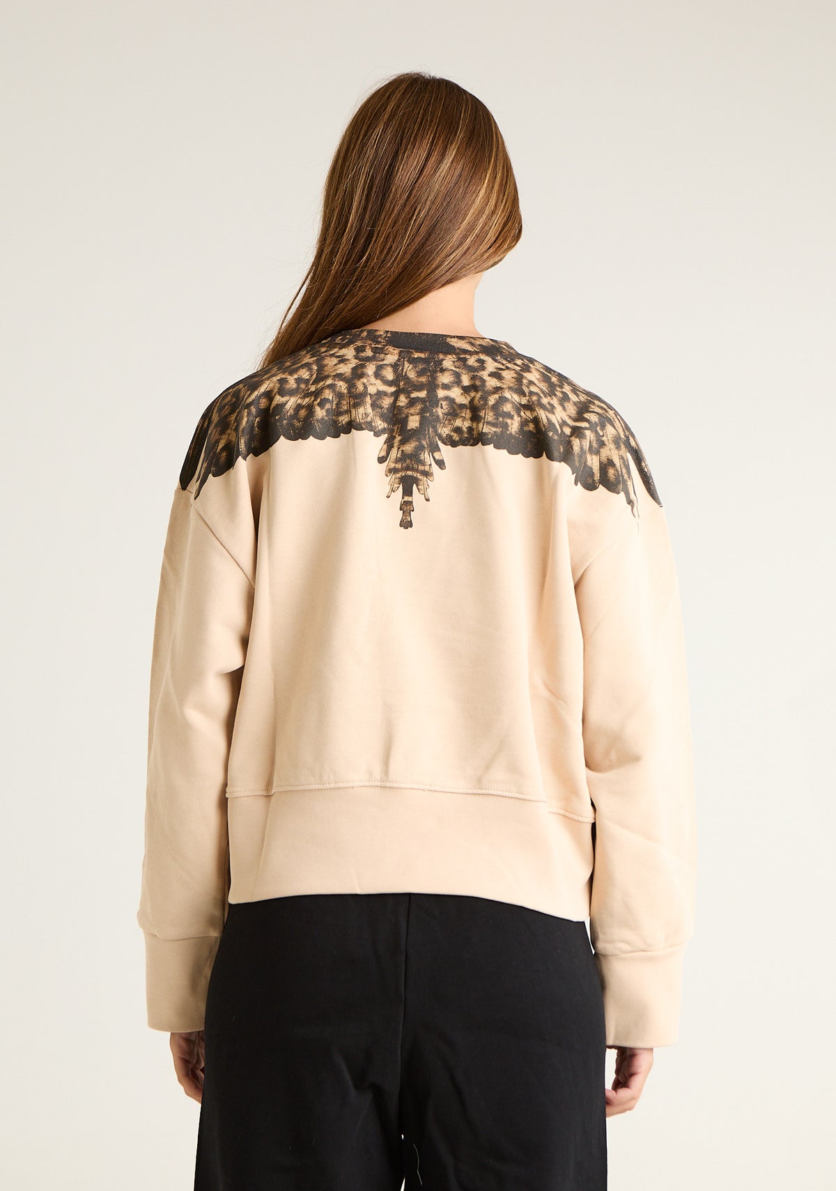Felpa girocollo con ali animalier