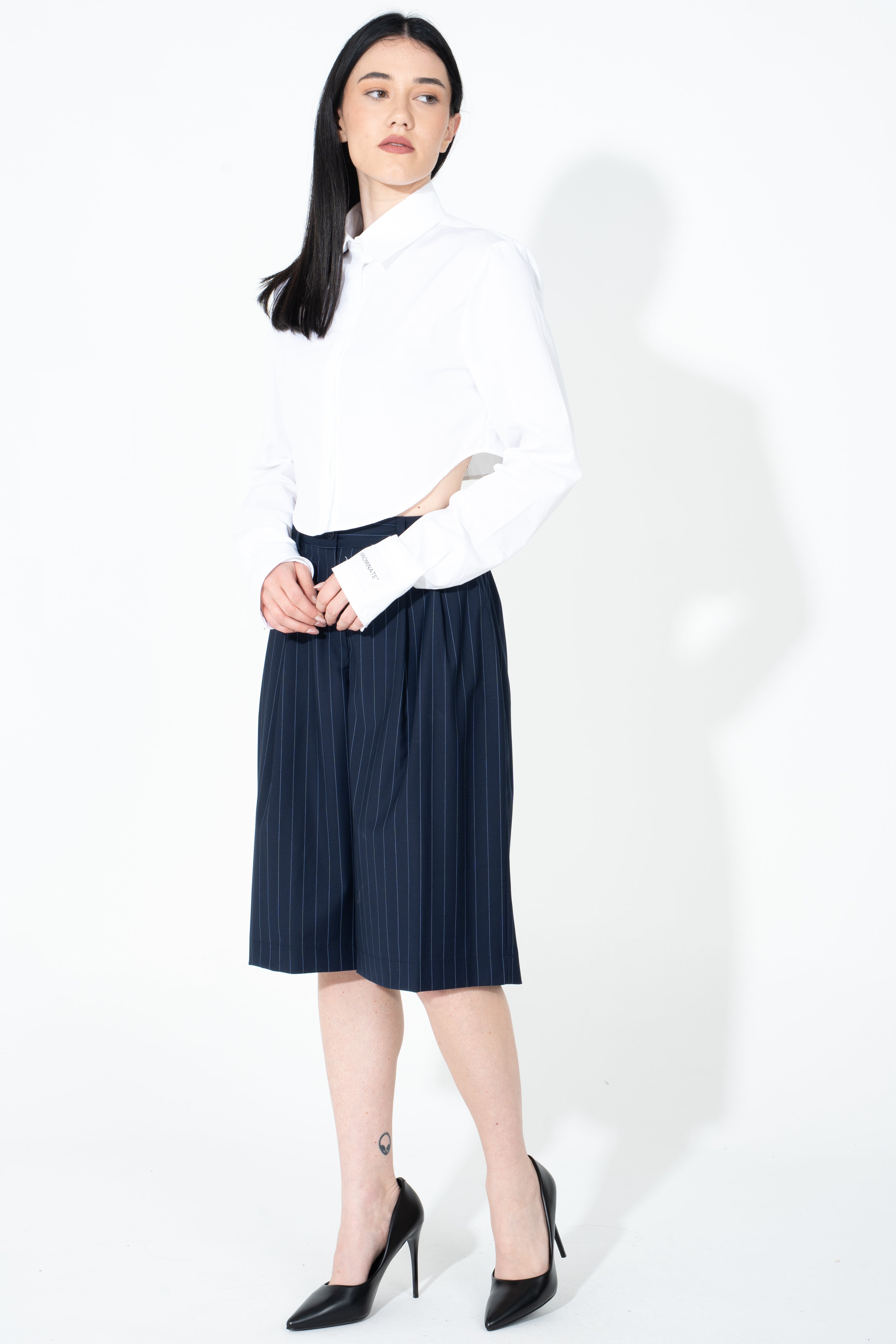 Camicia in cotone con sfondo stondato