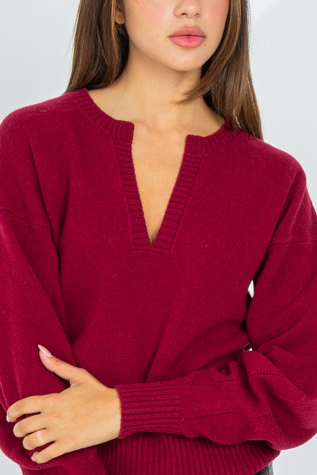 Wool sweater with profiled V-neck