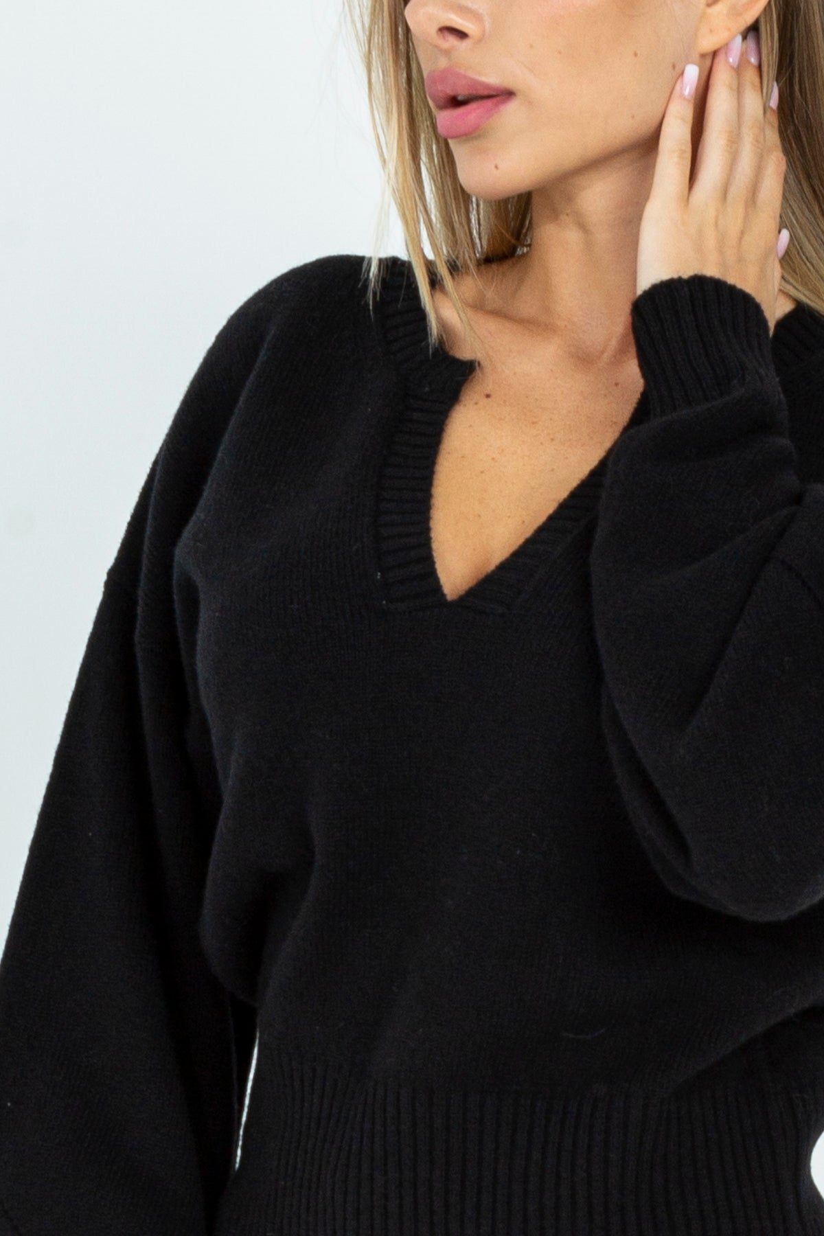 Wool sweater with profiled V-neck