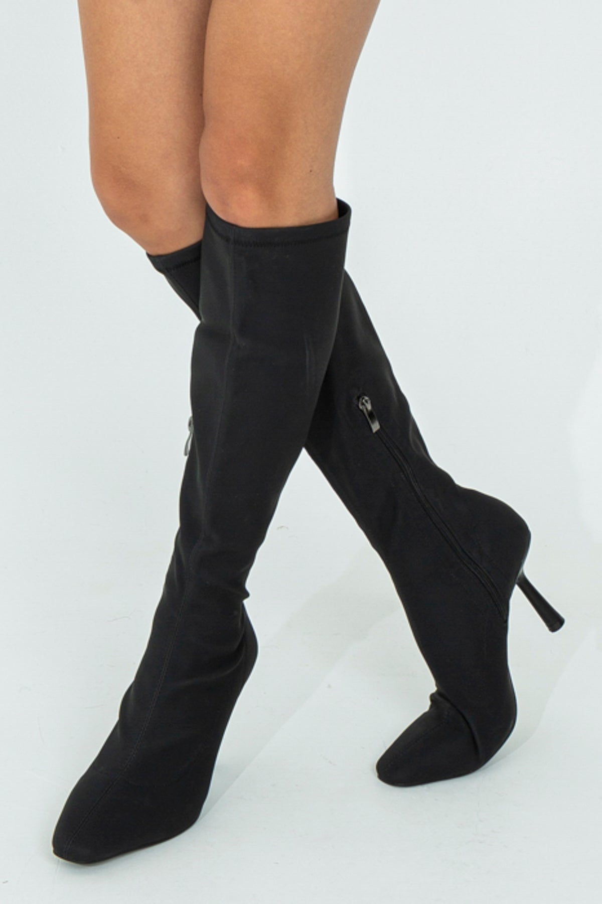 Heeled sock boot