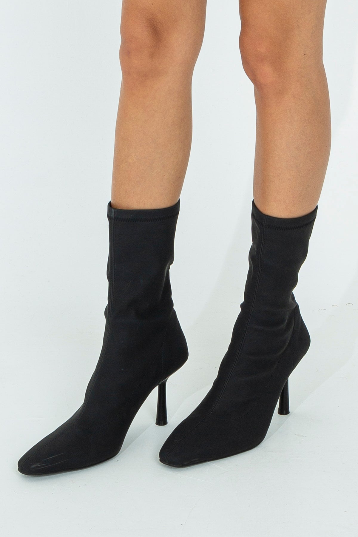 Heeled sock boot