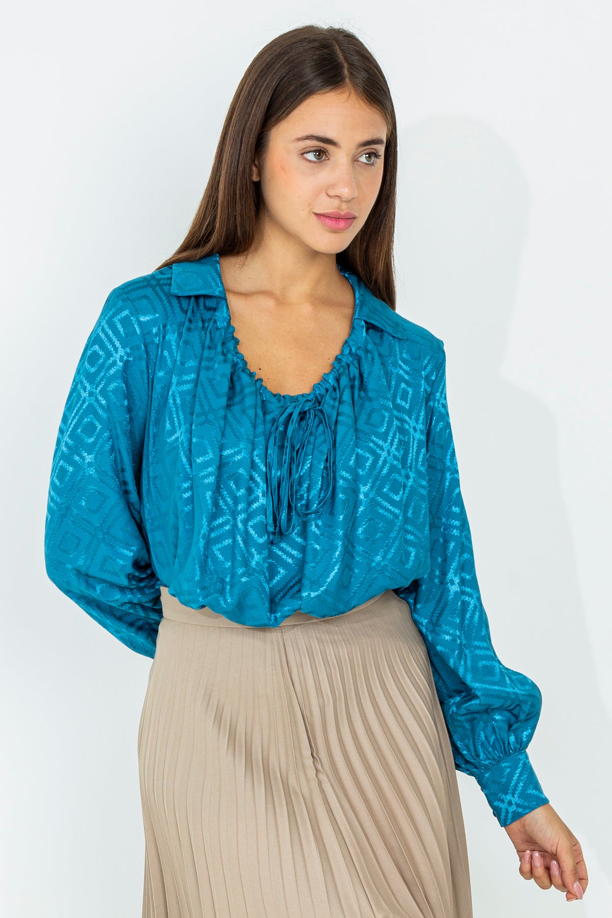 Blouse in embossed fabric