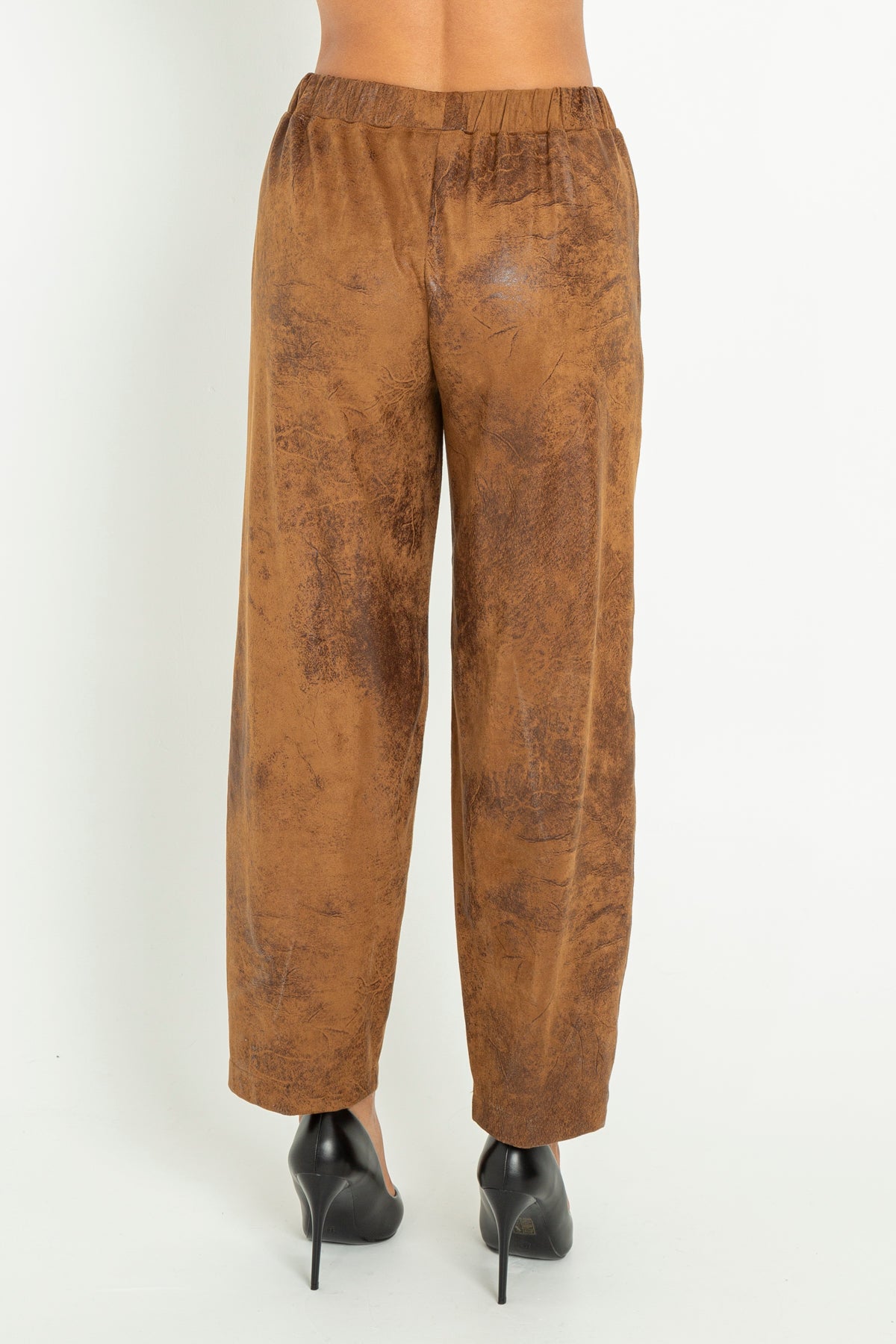 Aged faux leather trousers