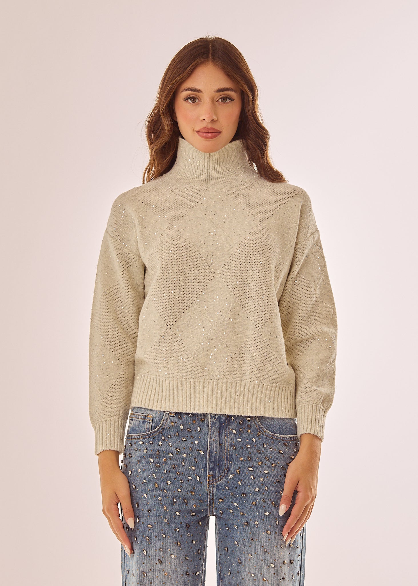 Maglia dolcevita con glitter e paillettes