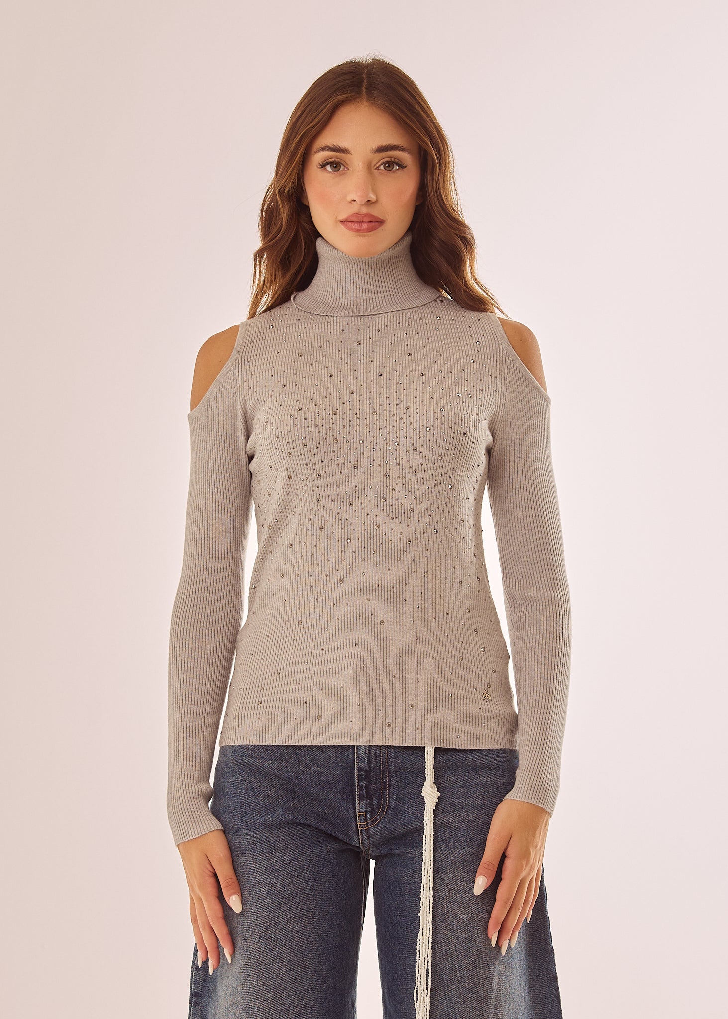 Maglia dolcevita con applicazioni