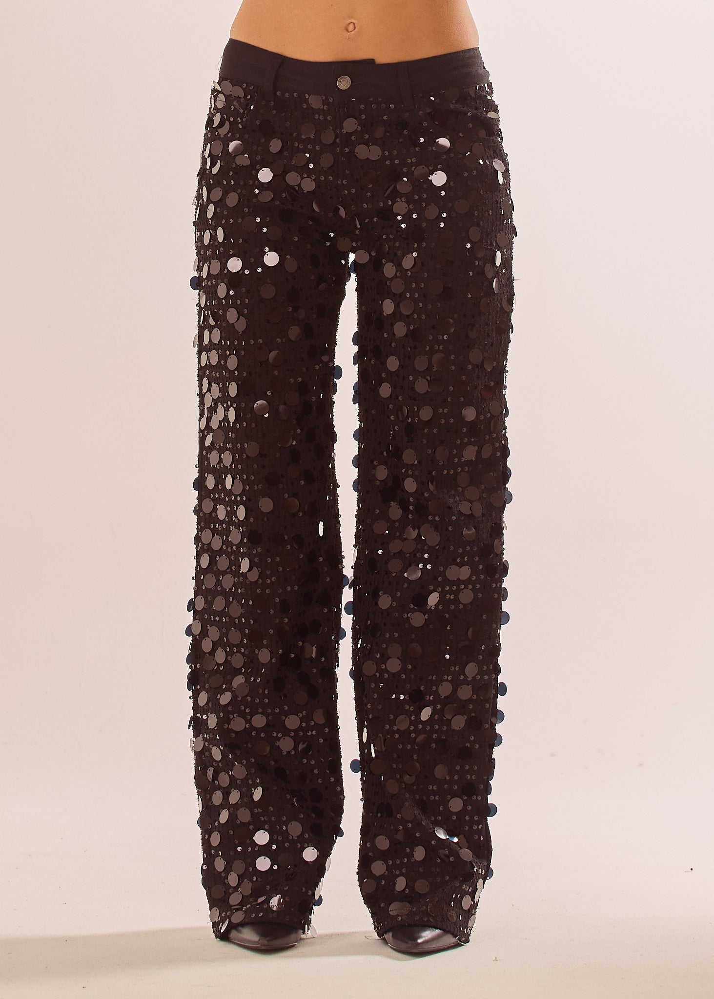 Jeans con paillettes grandi all over