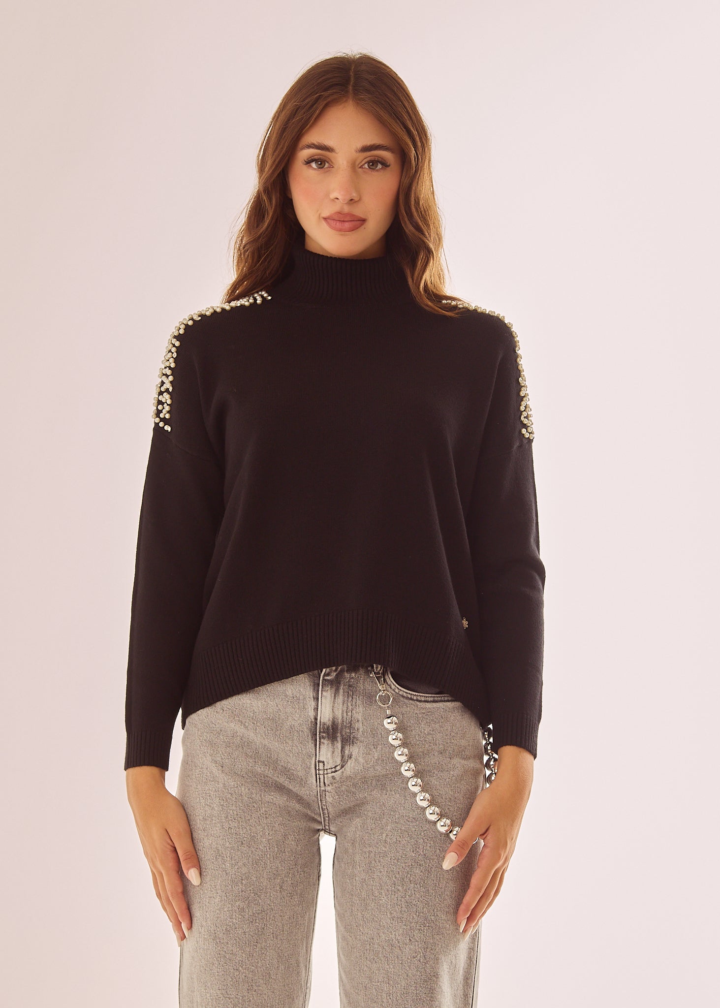 Maglia dolcevita con applicazioni