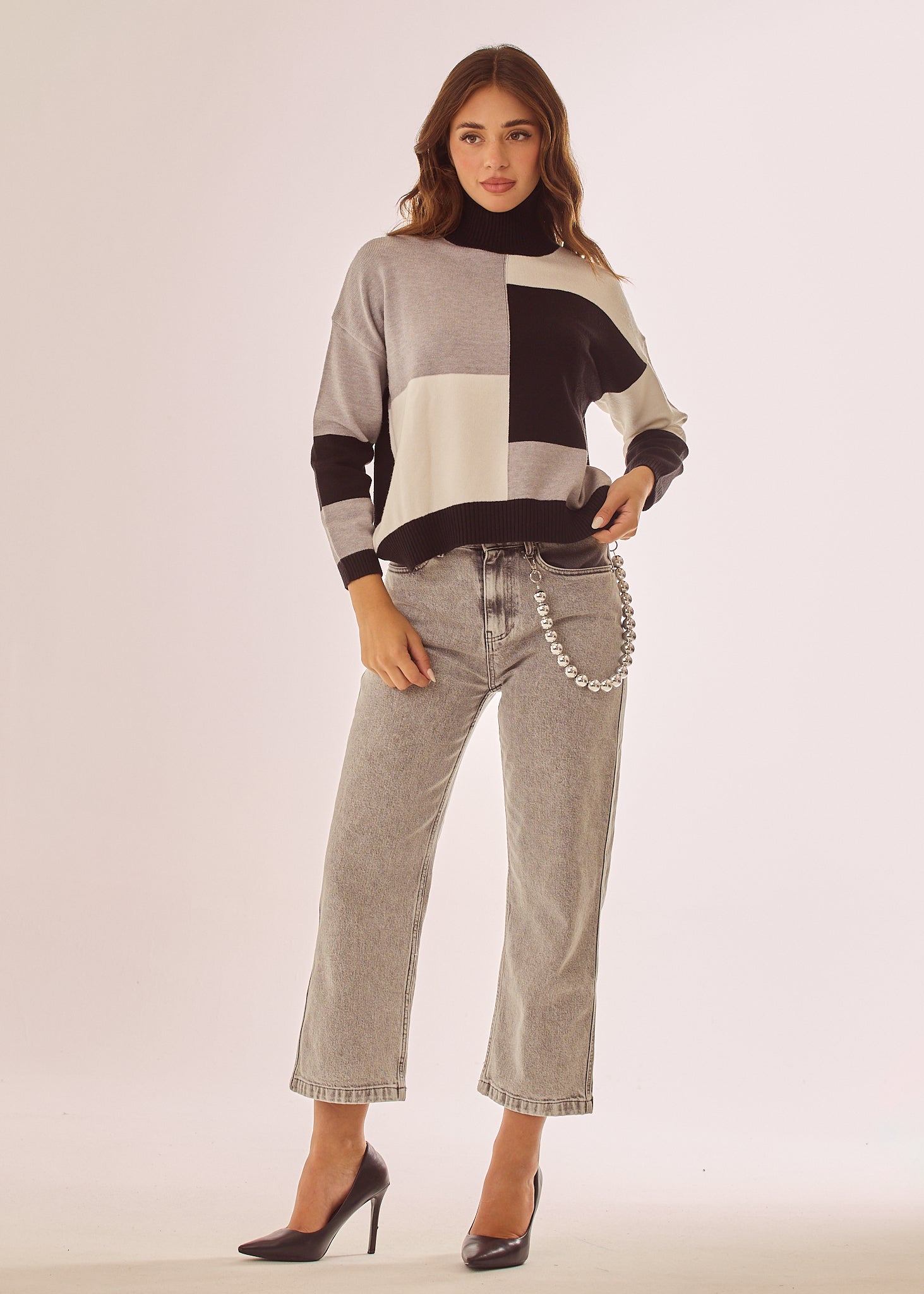 Jeans a trombetta con catena removibile