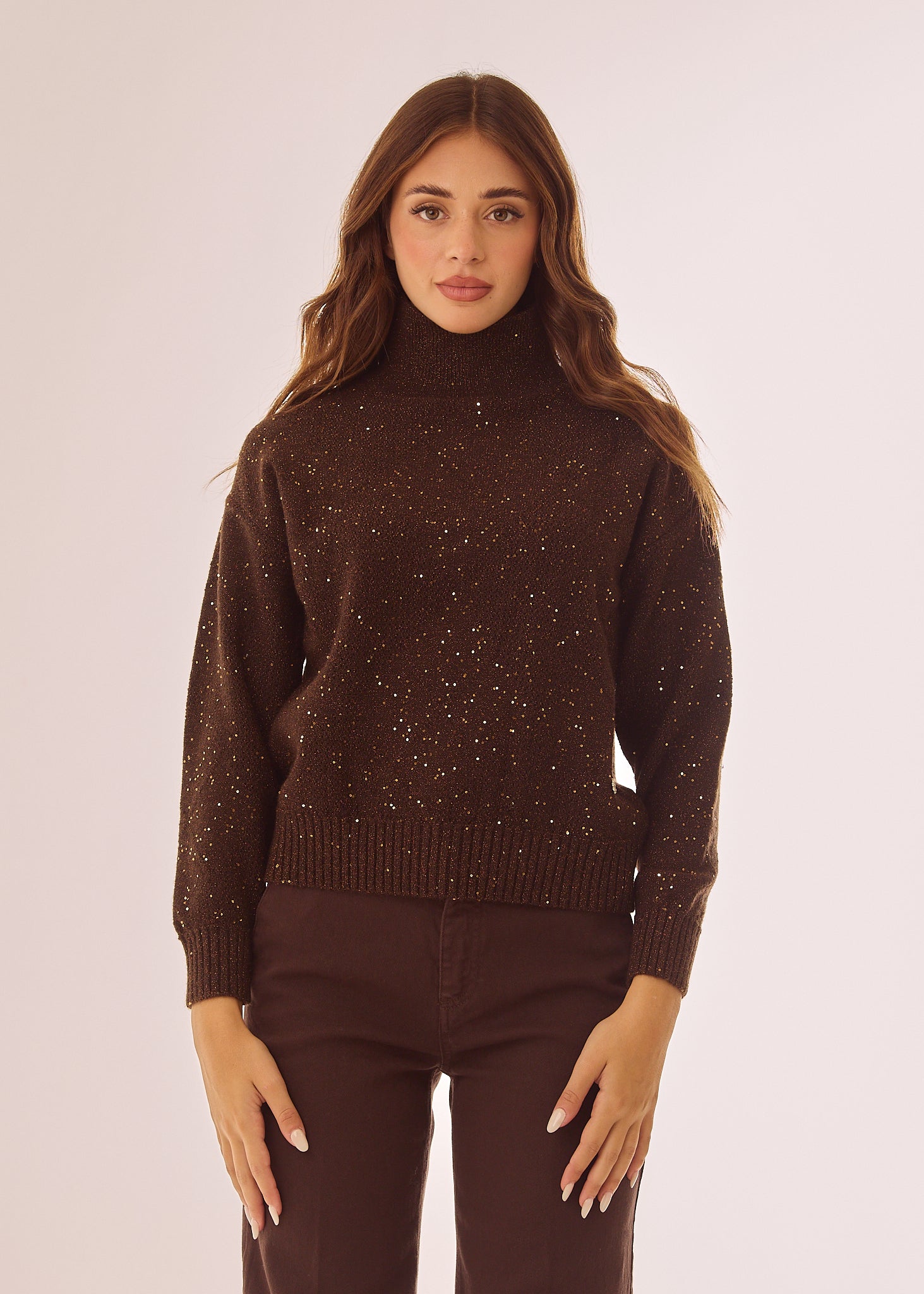 Maglia dolcevita con glitter e paillettes