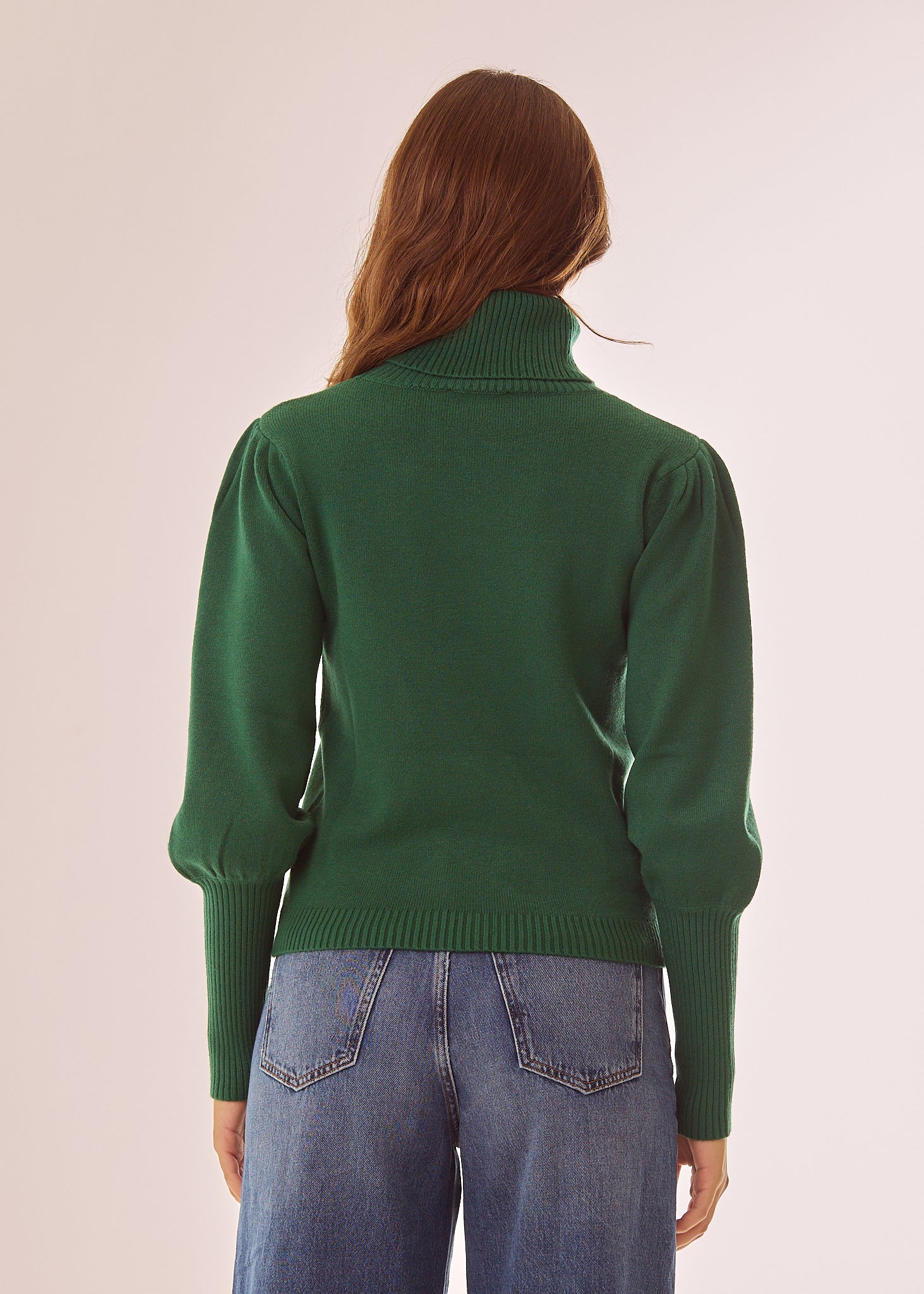 Maglia dolcevita con maniche lunghe a sbuffo