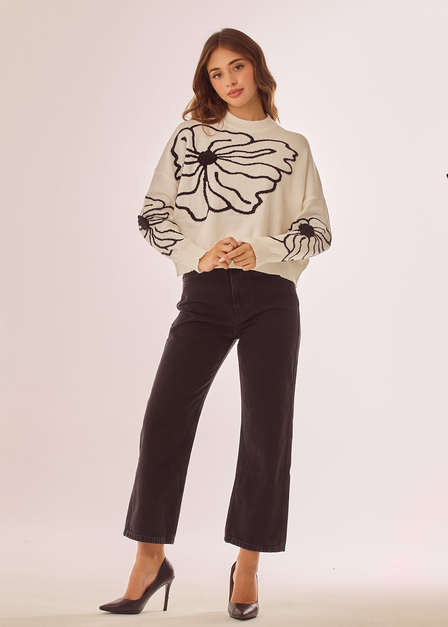 Maglia girocollo con disegni floreali