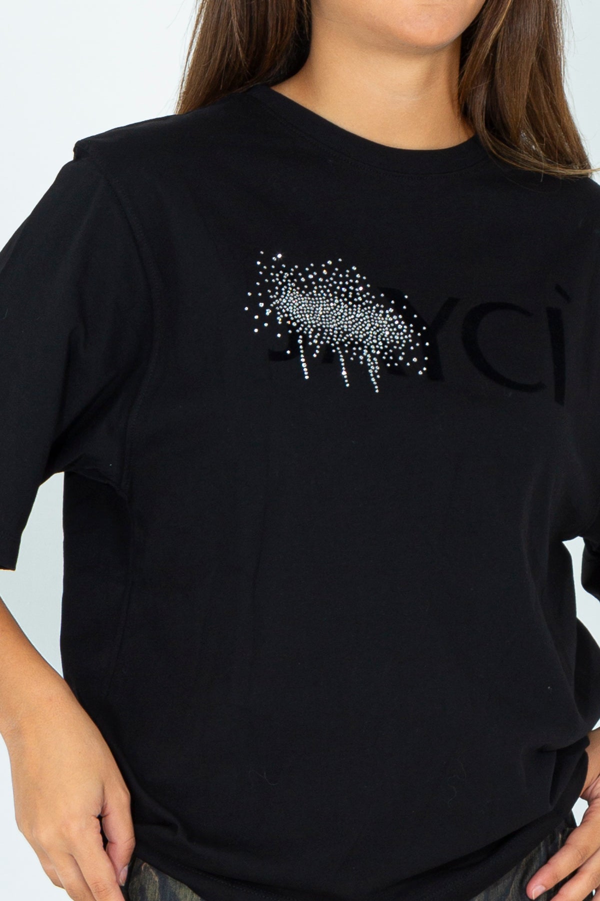 T-shirt with precious spray applications