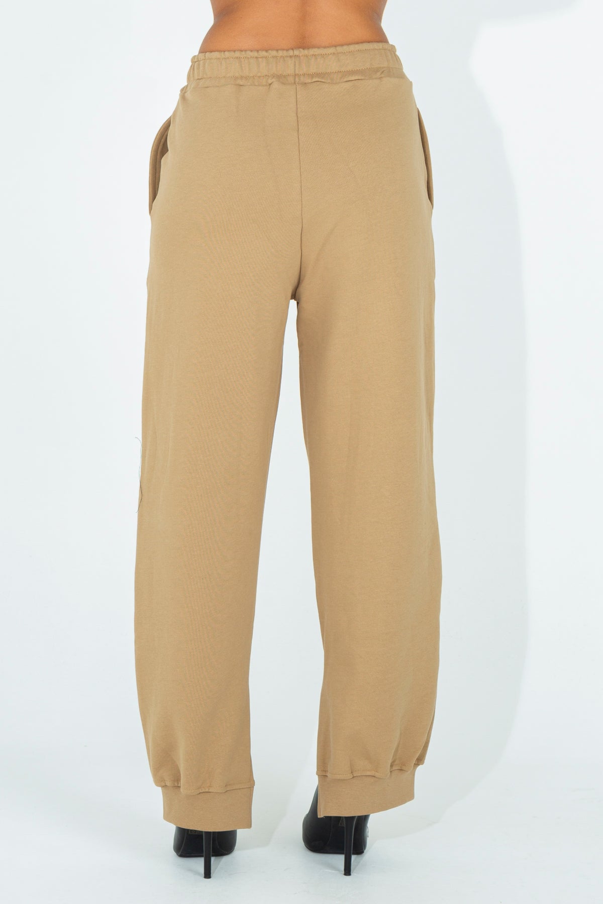 Tracksuit trousers with side opening